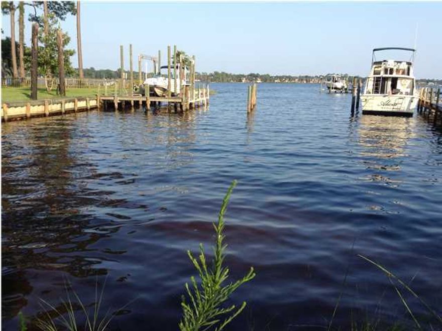 BEAUTIFUL WATERFRONT LOT READY TO BUILD ON. LOT IS CLEARED AND LOOKS OUT TO THE BAY AND ROCKY BAYOU. LOVELY NEW HOMES BEING BUILT IN THE AREA. WATER IS DEEP ENOUGH FOR SOME BOATS. LOT IS ACROSS THE BAY FROM BLUEWATER BAY MARINA. LOTS HAVE BEEN ENGINEERED AND CHECKED FOR WETLANDS. SETBACK IS 25' FROM THE WATER. BUILDING ON PILINGS IS REQUIRED. A ''SEASIDE'' HOUSE WOULD BE PERFECT FOR THIS LOT. PROPERTY IS CLOSE TO ALL THE NEW SHOPPING IN NICEVILLE.