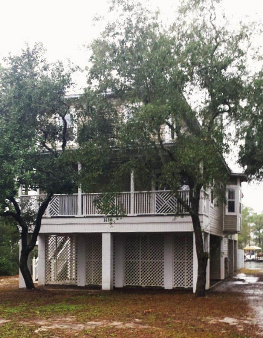 Three story waterfront home in a great neighborhood. This home features 2 fireplaces and 2 HVAC systems as well as 2 balconies and a large deck facing the bayou. The dining area features bamboo floors and a built in window seat. There are parking spaces on ground level. Home has new carpet and the interior has been completely repainted.