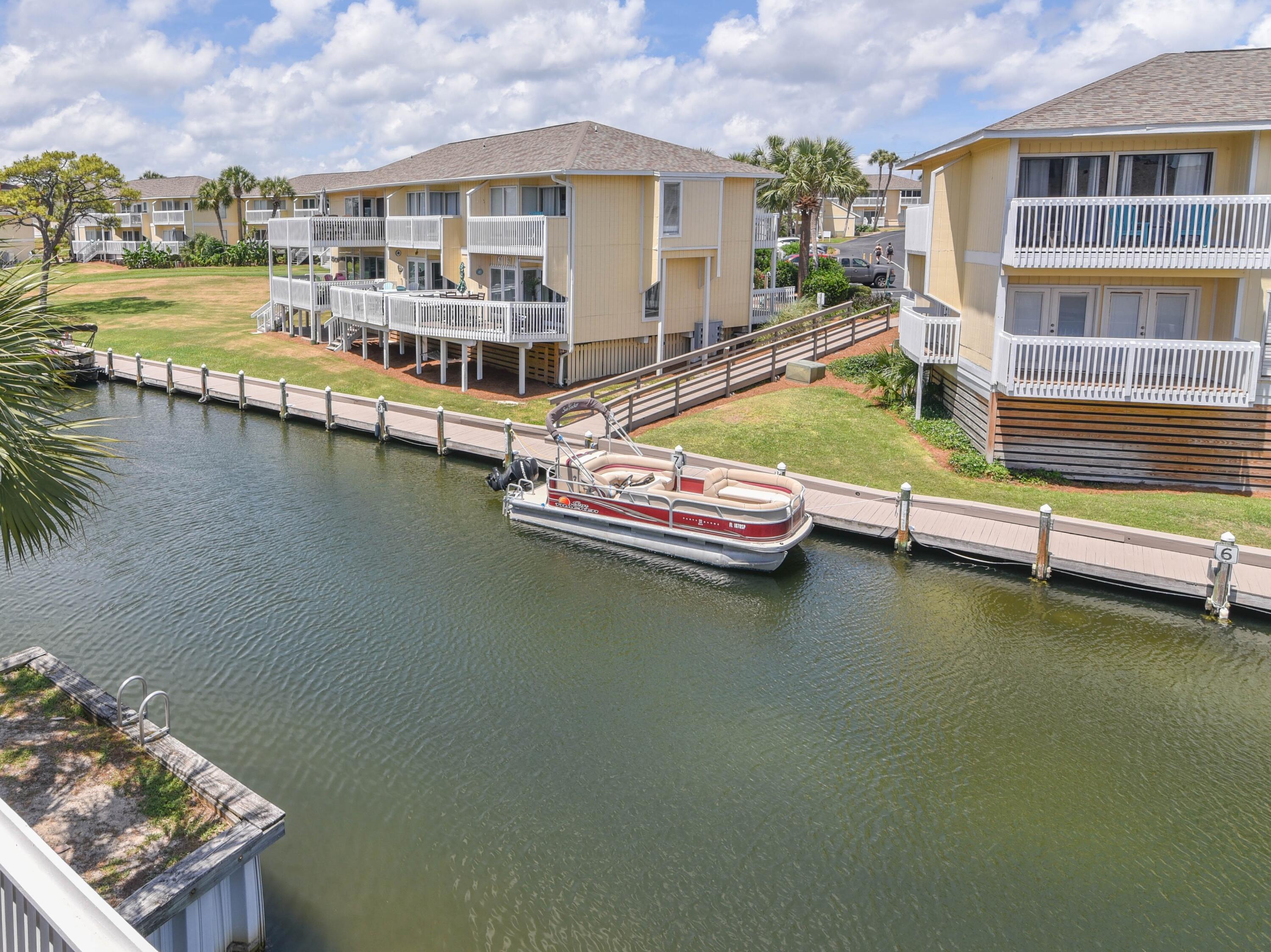 Canal Front 1 bedroom condo for only $314,900! Priced to sell and recently reduced by $20,000! 2nd floor unit is directly on the canal with fantastic waterfront views.Sandpiper Cove is a 43 acre gated community with 1,100 ft of private beach including beach chair service, snack bar, pavillon, and restrooms. The complex has many activities such as a 9 hole par 3 golf course, tennis and pickleball courts, shuffleboard, bocce ball, 5 pools (some heated), and 3 hot tubs. There is also a marina, boat slips, and boat ramp. Louisiana Lagnaippe Restaurant is located inside the complex by the marina. The water taxi picks up at Sandpiper Cove and drops off at many harbor attractions, restaurants, and bars. Great for permanent resident, 2nd home, or as a vacation rental