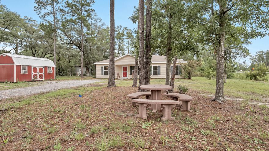 👀✔This 4 bedroom 2 bath well maintained home on 1/2 + acre lot boasts fresh paint throughout, ceramic tile floors, stainless steel kitchen appliances, new fixtures, surround sound wired and over 200 feet of HWY 331 frontage with general commercial possibilities: ''LIVE/WORK'' ie: artist studio, real estate office, accountant...endless professional opportunities with incredible visibility. Additional building can be connected to home for business purposes. Convenient 12X20 workshed with electricity. Seller has original architectural plans and landscaping design from Walton County Extension Service. EASY COMMUTE to Eglin AFB, Freeport, Bay and Beach. Put your boat in at Wheeler Pt, Grady Brown or Thomas Pilcher Parks less than 3 miles south. Buyer to verify all information.