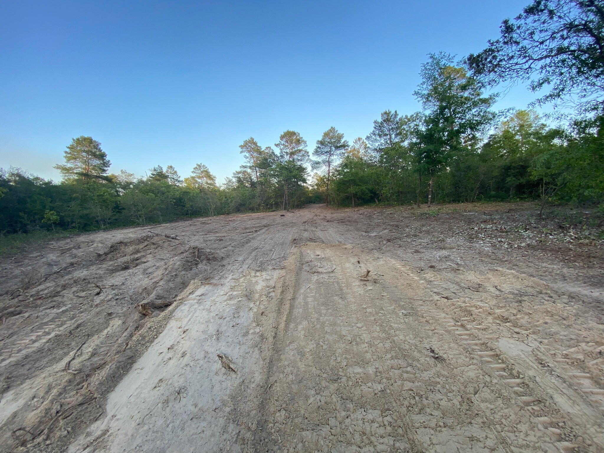 Build your dream home on this beautiful 5-acre parcel located off JW Hollington Rd in Freeport, Florida! This partially cleared property is ready for your vision, with city water tap already paid and installed and over 400 feet of water line run to a potential homesite--saving you time and money on utilities.Enjoy the privacy and space of country living while still being conveniently located just minutes from multiple public boat launches and the sugar-white sands of South Walton beaches. Whether you're looking to build a full-time residence, a weekend getaway, or an investment property, this acreage offers the perfect blend of rural charm and coastal convenience.Don't miss this rare opportunity to own usable land in one of the fastest-growing areas in Northwest Florida. No HOA, plenty of room for your home, garage, shop, or even a small farm. Boundary Survey and Wetland Delineation has already been completed (see photos).
Schedule your showing today and start building your future in Freeport!
