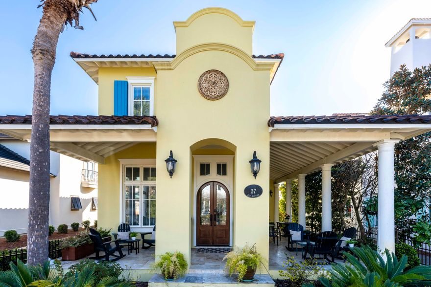 Welcome to the gated beachfront Neighborhood of Caribe where you are invited to discover 27 Rue Martine, with open floor featuring 4 bedrooms and 3.5 baths of which one bedroom and a bath are tucked away in the Guest House. As you enter the well-conceived interior space through the double mahogany doors of the living room with fireplace you are immediately drawn through the home, past the staircase with 23 foot ceiling height, beyond the formal dining room, and kitchen and dining/sitting area to the tall French doors inviting you to the courtyard. 27 Rue Martine is differentiated by the home's well-conceived floor plan for entertaining, natural light, numerous tall windows accentuated by transoms, high ceilings throughout, crown molding, French doors, large bright and airy well-appointed kitchen, walk-in pantry, built in customized niches, quality hard surface flooring travertine and wood flooring, oversized laundry room, large guest bath, and thoughtfully designed interiors letting on to the wrap around porch with fireplace, guest house and the spacious courtyard. The driveway can accommodate four vehicles.  The primary bedroom features two closets, private bath with linen closet, separate glass shower which adjoins the vanity, a soaking tub and water closet.  The kitchen features ample countertop space, Viking slide in gas range with 6 burners and griddle for gourmet cooking, windows over the sink and next to the range and walk in pantry.  The kitchen marries the informal dining room which may also be furnished and enjoyed as a sitting area.   Whether you wish to entertain indoors, outdoors, formally or informally, you and your guests will enjoy gracious Caribbean Style living among the beauty of Caribe.  Caribe is a picturesque beach neighborhood tucked away on an uncrowded stretch of beach in Miramar Beach is always beautiful, never crowded as rentals are limited to a minimum of one week and a maximum of 8 person occupancy. Owners enjoy tennis/pickleball court, two gleaming swimming pools with bath houses, lake pavilion with bath house, two beach walkovers and professional beach service, beautiful beaches, sidewalks for strolling throughout the neighborhood, courtesy patrol, gated entry with soft evening lighting and beautiful streetscape. Live and play minutes from the area's finest golfing, tennis, dining and shopping. Explore nearby Silver Sands Premium Designer Outlet, Grand Boulevard, Market Shops at Sandestin and AMC Classic Boulevard 10. On Saturday mornings after a walk on the beach, head to the Farmer's Market at Grand Boulevard for fresh fruits, vegetables and local honey, or breakfast at the Market Shops at Sandestin. We invite you to make an appointment today to discover 27 Rue Martine located in picturesque Neighborhood of Caribe.