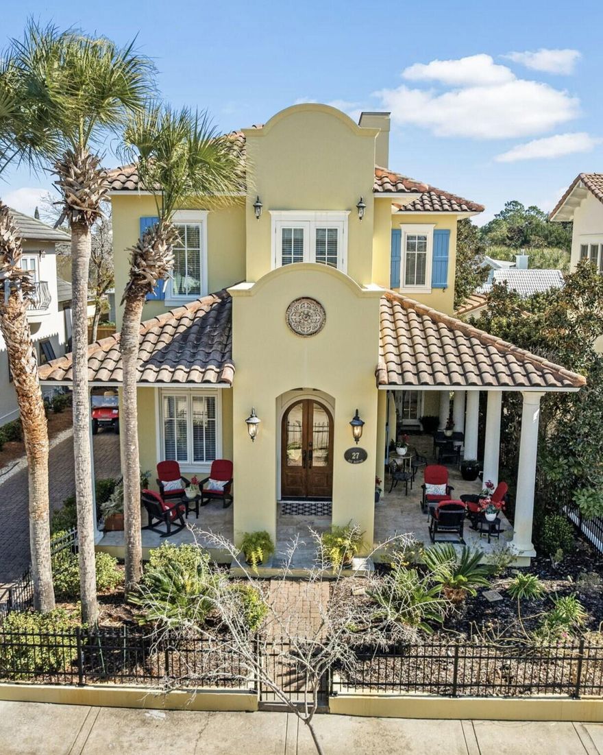 VIDEO will be posted soon.  Welcome to the gated beachfront Neighborhood of Caribe where you are invited to discover 27 Rue Martine, with open floor featuring 4 bedrooms and 3.5 baths of which one bedroom and a bath are tucked away in the courtyard Guest House. As you enter the well-conceived interior space through the double mahogany doors of the living room with fireplace you are immediately drawn through the home, past the staircase with 23 foot ceiling height, beyond the formal dining room, and kitchen and dining/sitting area to the tall French doors inviting you to the courtyard. 27 Rue Martine is differentiated by the home's natural light, numerous tall windows accentuated by transoms, high ceilings, travertine flooring, crown molding on the first floor and Primary Bedroom En-Suite, French doors, large bright and airy well-appointed kitchen, walk-in pantry, built in customized niches, quality hard surface flooring, oversized laundry room, large guest bath, and thoughtfully designed interiors letting on to the wrap around porch with fireplace, guest house and the spacious courtyard. The driveway can accommodate four vehicles.  The primary bedroom features two closets, private bath with linen closet, separate glass shower which adjoins the vanity, a soaking tub and water closet.  The kitchen features ample countertop space, Viking slide in gas range with 6 burners and griddle for gourmet cooking, windows over the sink and next to the range and walk in pantry.  The kitchen marries the informal dining room which may also be furnished and enjoyed as a sitting area.   Whether you wish to entertain indoors, outdoors, formally or informally, you and your guests will enjoy gracious Caribbean Style living among the beauty of Caribe.    Caribe is a picturesque beach neighborhood tucked away on an uncrowded stretch of beach in Miramar Beach is always beautiful, never crowded as rentals are limited to a minimum of one week and a maximum of 8 person occupancy. Owners enjoy tennis/pickleball court, two gleaming swimming pools with bath houses, lake pavilion with bath house, two beach walkovers and professional beach service, beautiful beaches, sidewalks for strolling throughout the neighborhood, courtesy patrol, gated entry with soft evening lighting and beautiful streetscape. Live and play minutes from the area's finest golfing, tennis, dining and shopping. Explore nearby Silver Sands Premium Designer Outlet, Grand Boulevard, Market Shops at Sandestin and AMC Classic Boulevard 10. On Saturday mornings after a walk on the beach, head to the Farmer's Market at Grand Boulevard for fresh fruits, vegetables and local honey, or breakfast at the Market Shops at Sandestin. We invite you to make an appointment today to discover 27 Rue Martine located in the picturesque Neighborhood of Caribe.
