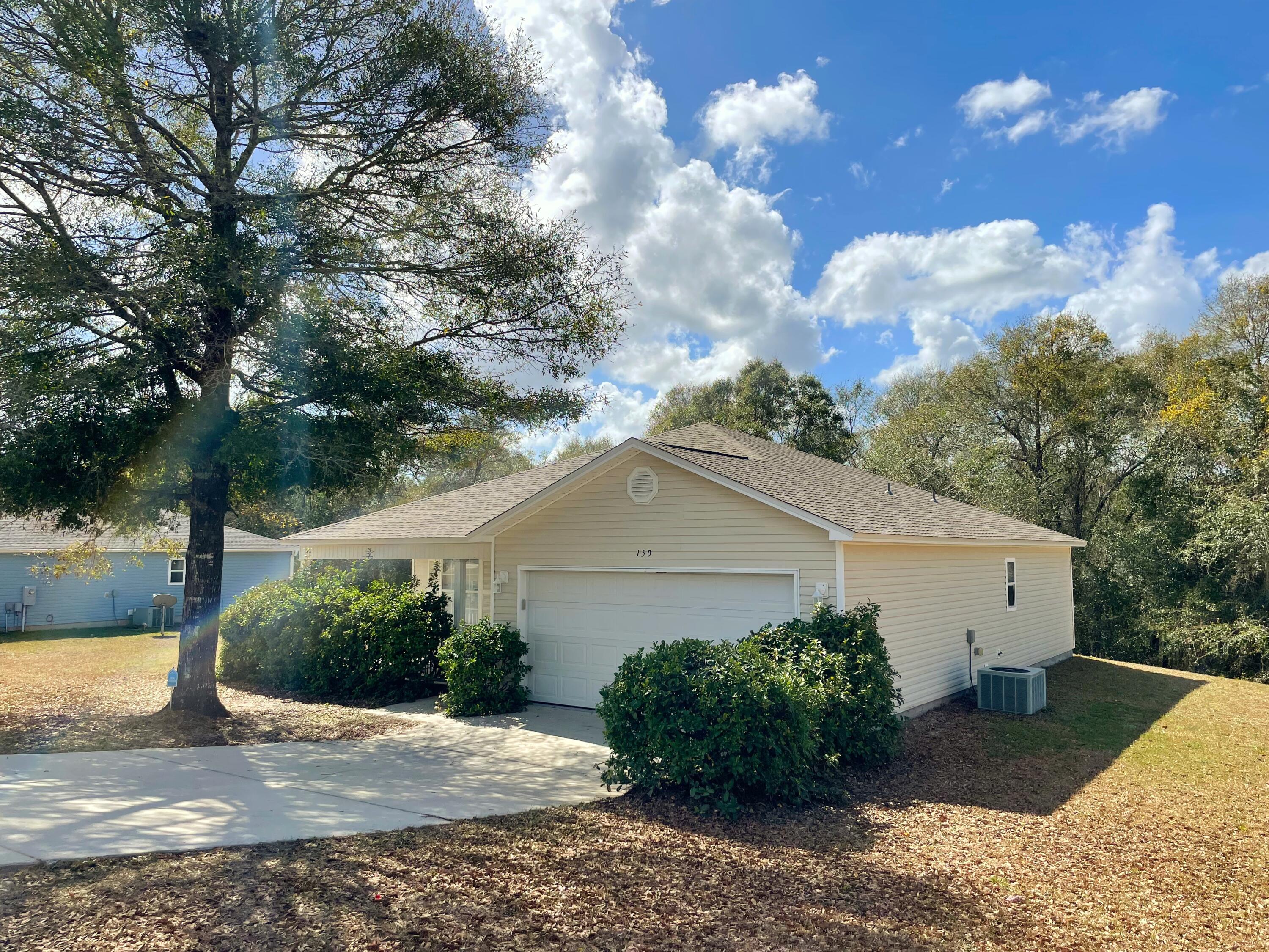 Clean, well-maintained home in a great neighborhood. 3BD/2BA home with 2-car garage. Perfect location with easy access to both Hwy 85 and Hwy 90. Large covered front porch and nice back deck with a view of beautiful trees. Wonderful open concept with split-bedroom floor plan, vaulted ceilings, and walk in closets. Washer/dryer hook-ups in garage. New roof. Tenants must be non-smoking and have great credit. Pet Restrictions apply
