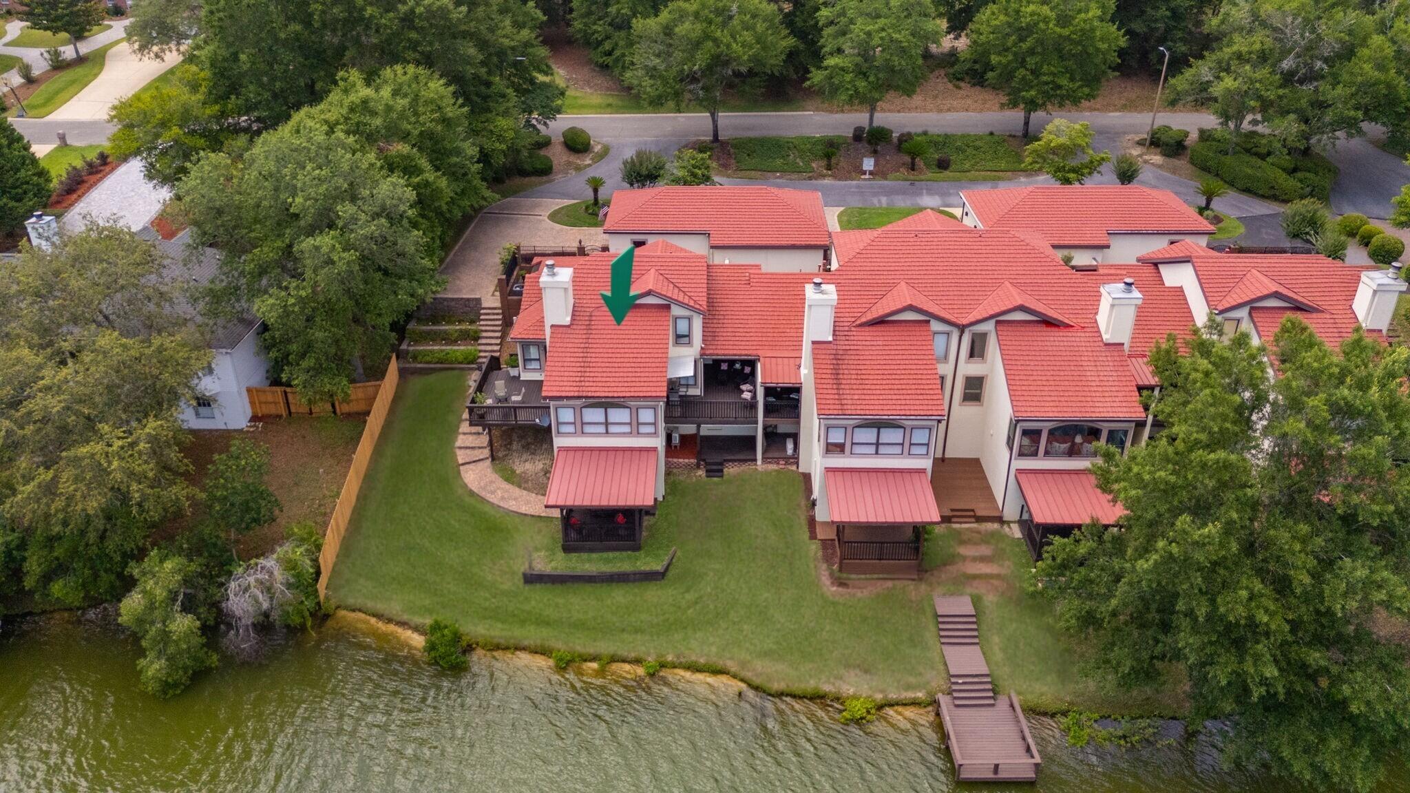 Lakefront Luxury Awaits at Rocky Bayou Country Club Estates. Discover the perfect blend of elegance and tranquility in this stunning end-unit villa on Lake Henderson. Enter the home through your own private courtyard. Tucked away in a quiet cul-de-sac, this home offers tranquil water views from the main living area and master bedroom, creating an atmosphere of pure relaxation. Step inside to find new hardwood flooring and carpet on the main floor, complemented by soaring vaulted ceilings. Windows flood the space with natural light. The gas fireplace provides warmth and charm, while the kitchen's office alcove offers a peaceful spot to take in the surrounding scenery.The master suite is a true retreat, featuring a whirlpool tub, large walk-in shower, skylights, and walk-in closet. Outside, embrace lakeside living with 3 decks and a terraced hill with paver steps leading to the lake. Enjoy effortless entertaining with a natural gas hookup for your grill, plus a shared dock for easy lake access.
The spacious 2.5-car garage and ample storage ensure all your needs are met, while the HOA-maintained lawn keeps the property pristine year-round.
With a 2022 inspection confirming 25 years of remaining life on the metal roof, a termite bond in place, and a desirable location in Rocky Bayou Country Club Estates, this villa offers the ideal opportunity to live a life of leisure on the lake.
Make this lakeside dream your reality today!