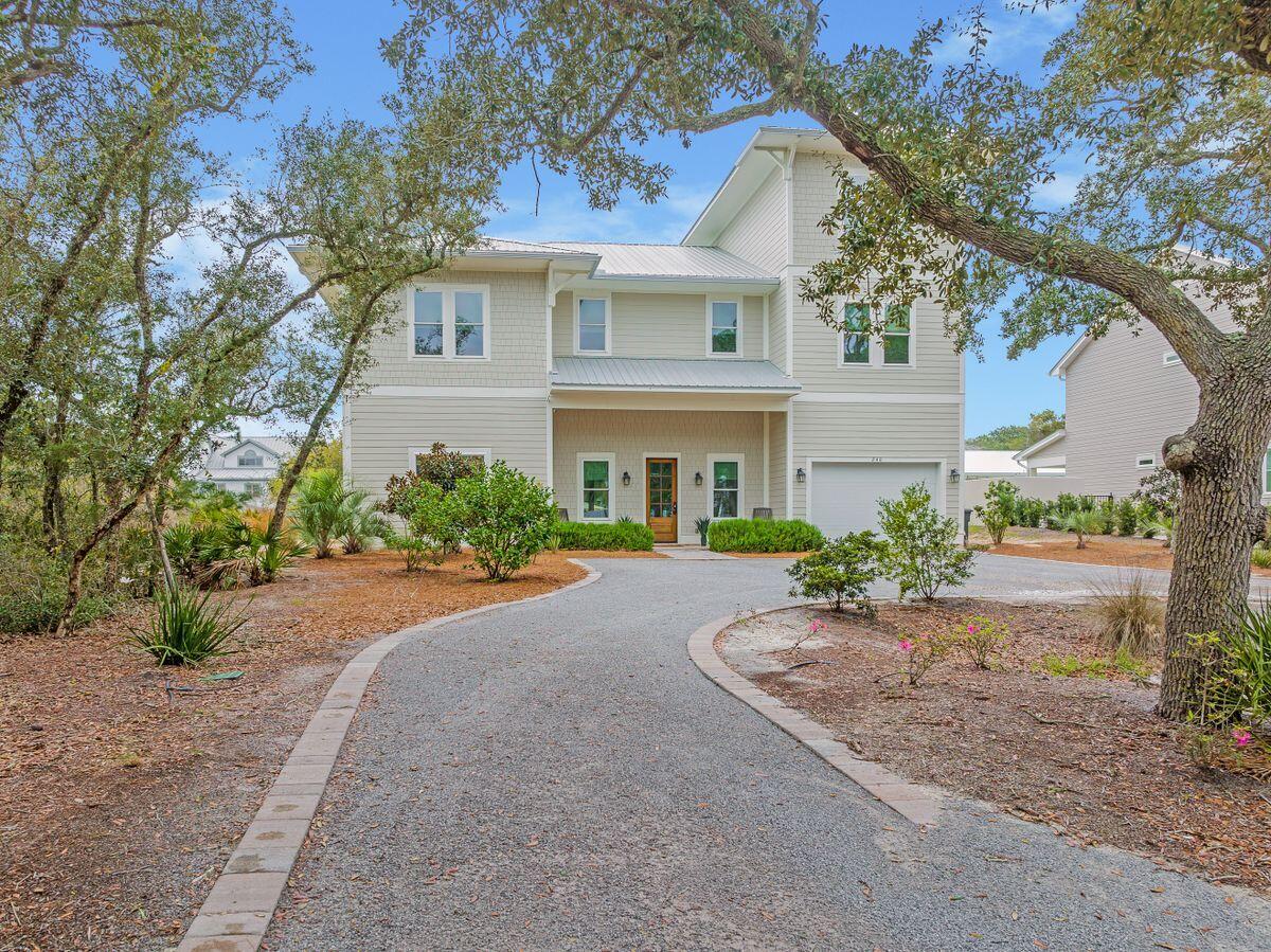 Built in 2019, this beautiful beach home is situated on a massive half-acre lot that has ample privacy and captures stunning gulf vistas from the top floor. The community of Gulf Pines presided over one of the quietest and most private beaches in the area and has surprisingly low HOA fees of only $300 annually. This contemporary 2019 beach house has space to spread out and enjoy the Florida lifestyle. The private southwest-facing yard has an enviable 18-ft. by 35-ft. private pool with overflow spa and a shallow tanning ledge for relaxing. Stretching over 100 feet, there's still ample space to add a carriage house which would truly maximize the rental potential of this home.