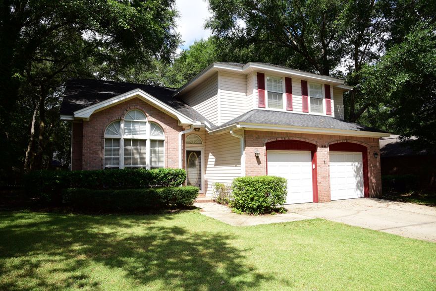 Price reduction on this wonderful Bluewater Bay home ideally located in the gated community of Parkwood Estates.  Enjoy the convenience of living near Bluewater Elementary, shops, restaurants and all the amenities the community has to offer. The living room and entry have high ceilings and the open staircase adds to the ambiance. The kitchen has oak, raised panel cabinets and stainless appliances.  Just off the kitchen the den features a fireplace and double sliding doors which allow you to open the room up to the adjoining outdoor deck. All bedrooms are on the second floor and have spacious closets. The large lot with mature trees provides shade for summertime fun. Owner is willing to install a new roof with acceptable offer, HWH 2014, HVAC 2009. Schedule your showing today!