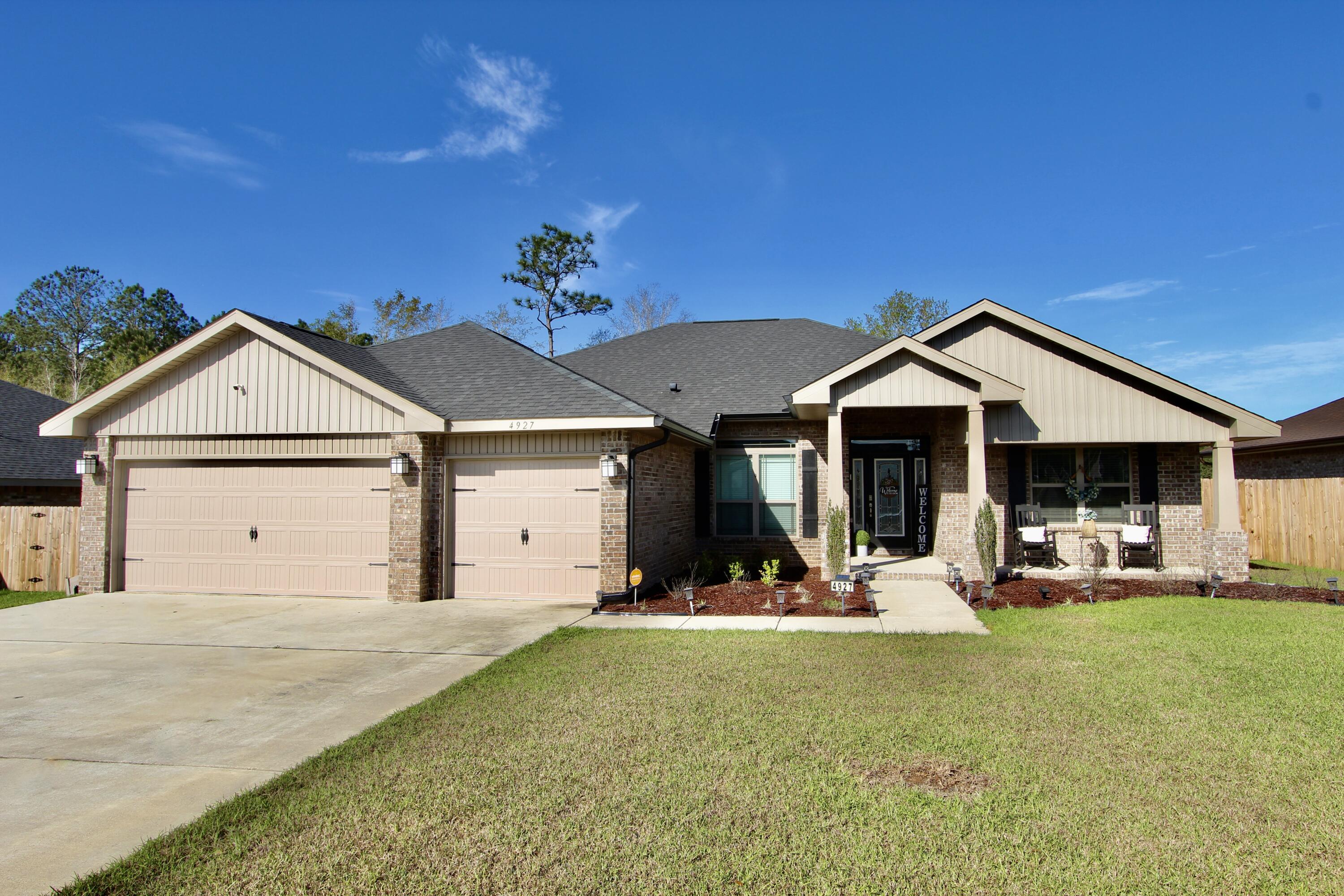 This Craftsman Style home features 4 bedrooms, 3 full baths and a 3 car garage. It is a split floor plan. The kitchen features stainless steal appliances and has granite counter tops. The master bath has dual sinks, soaker tub and separate shower and walk in closet. The main living areas has LVP flooring and carpet in the bedrooms. The yard is fenced in for privacy, irrigation system.