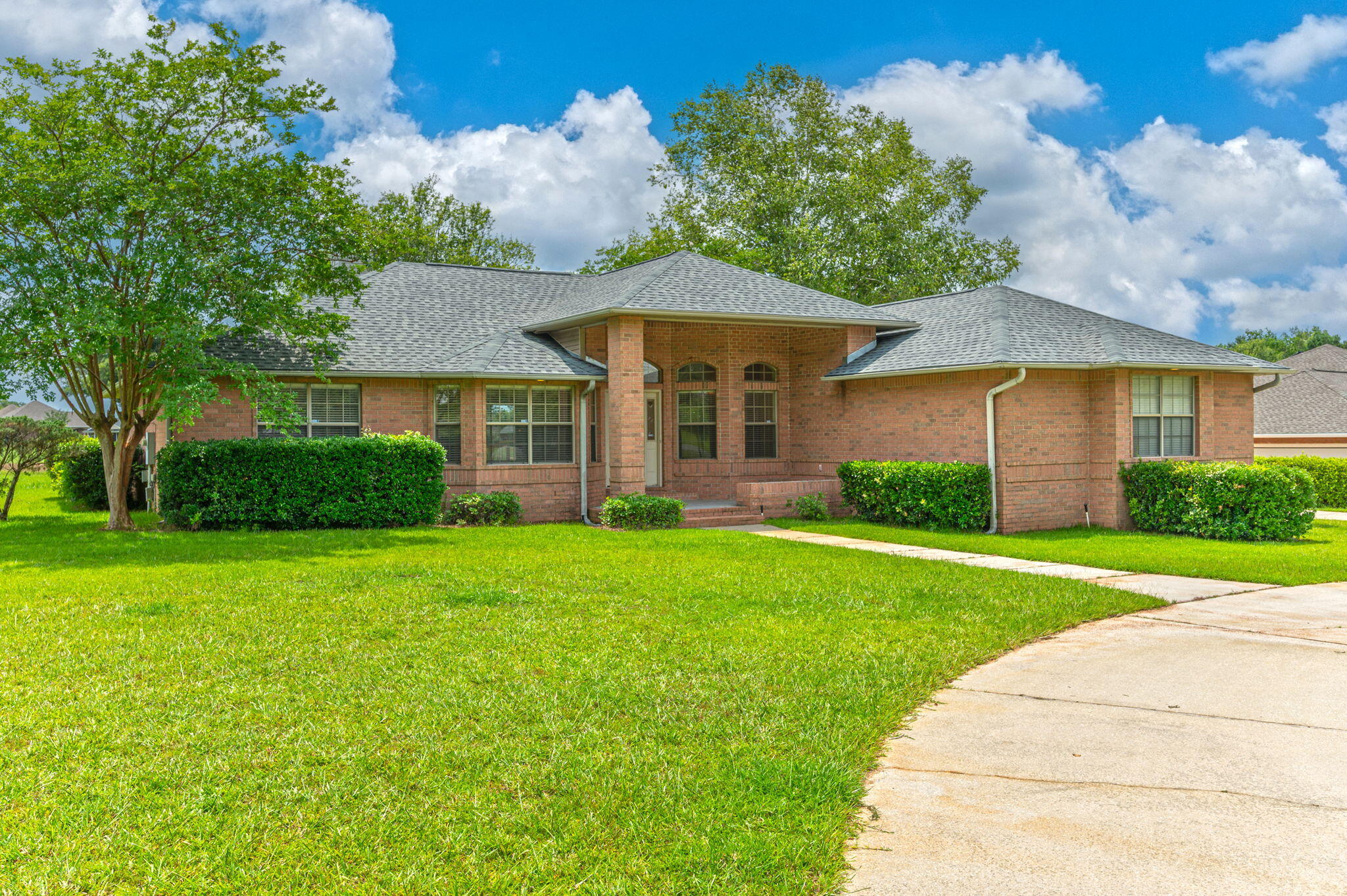 Fore-tunately Fabulous Golf Course Home!Welcome to your new slice of paradise, where the grass is always greener. This charming 4-bedroom, 3-bathroom home is the perfect blend of luxury and leisure, nestled against the backdrop of the 14th tee at Stonebrook Golf Club. Enjoy an open concept kitchen and living space perfect for your Par-tees. The 4th bedroom could flex to a den or office (closet included) and the formal dining area provides yet another opportunity to spread out. The star of the show is truly the screened back patio which overlooks the course and leads to a wooden deck. Your family will enjoy the privacy of a split floorplan and having their own bathrooms! The roof was replaced in 2019; water heater recently replaced as well!