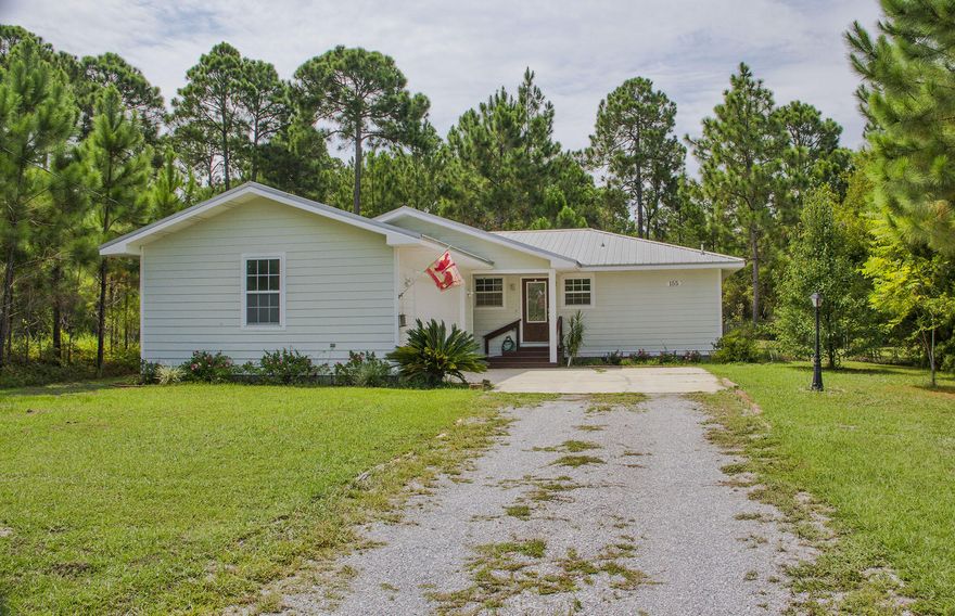Country living close to the beach. Conveniently located in Santa Rosa Beach, this home features a large open floor plan. Recent renovations are now complete with tile and wood flooring through out, stainless steel appliances, solid surface counter tops. A cozy sunroom can be and additional bedroom, office or exercise room. The back yard is completely fenced in and is perfect for pets and family fun. Be sure to include this home on your Must See list.