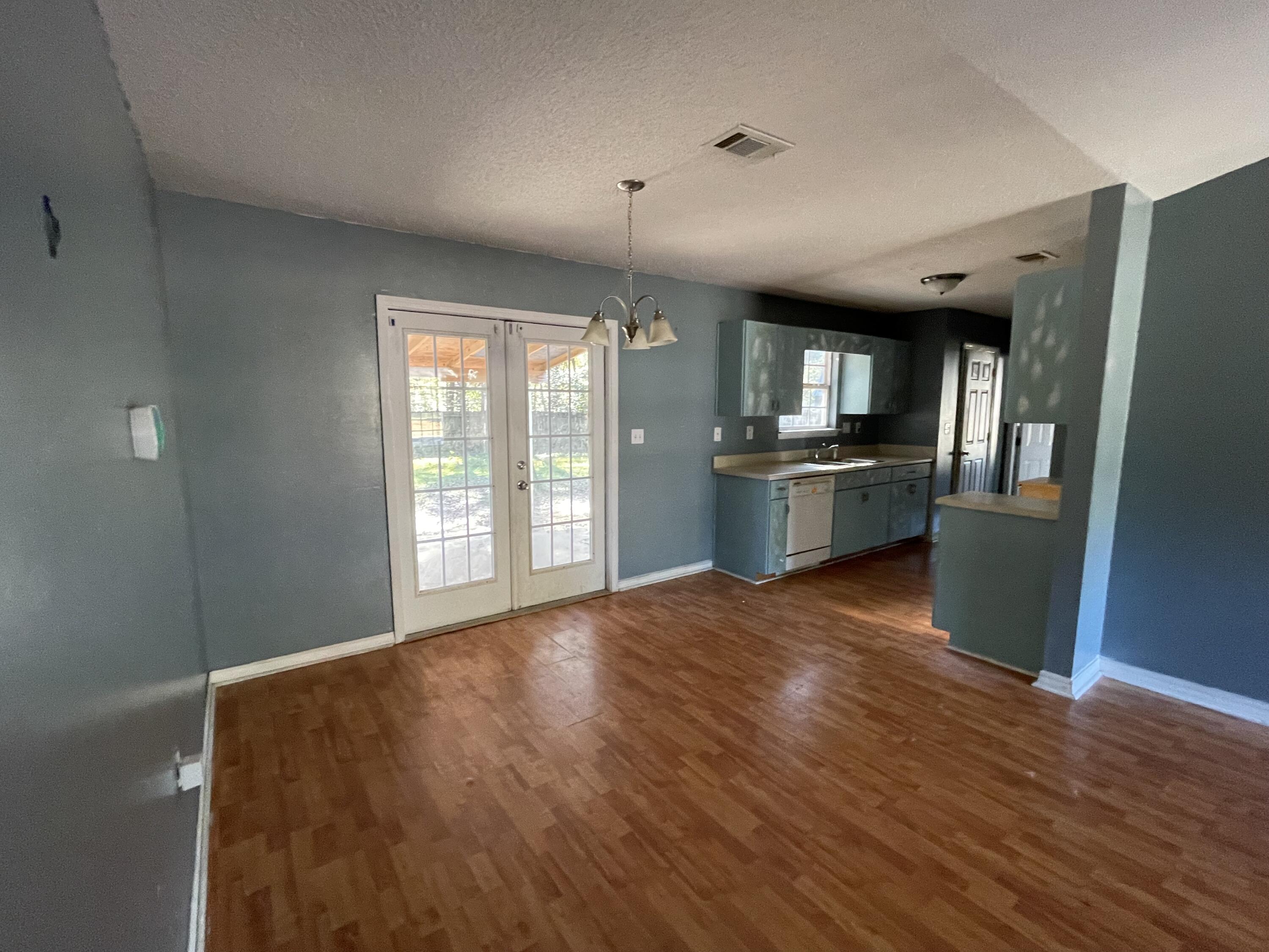 This super cute REO comes with tons of potential, great price and convenient location. Built in 2005, this split bedroom 3 bedroom homes original garage was enclosed and is counted towards overall square footage. Back yard is fenced. Due potential repairs required, no all financing will apply for this one. Call today before this one is Gone!