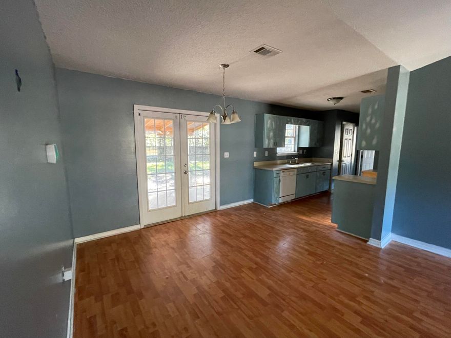 This super cute REO comes with tons of potential, great price and convenient location. Built in 2005, this split bedroom 3 bedroom homes original garage was enclosed and is counted towards overall square footage. Back yard is fenced. Due potential repairs required, no all financing will apply for this one. Call today before this one is Gone!