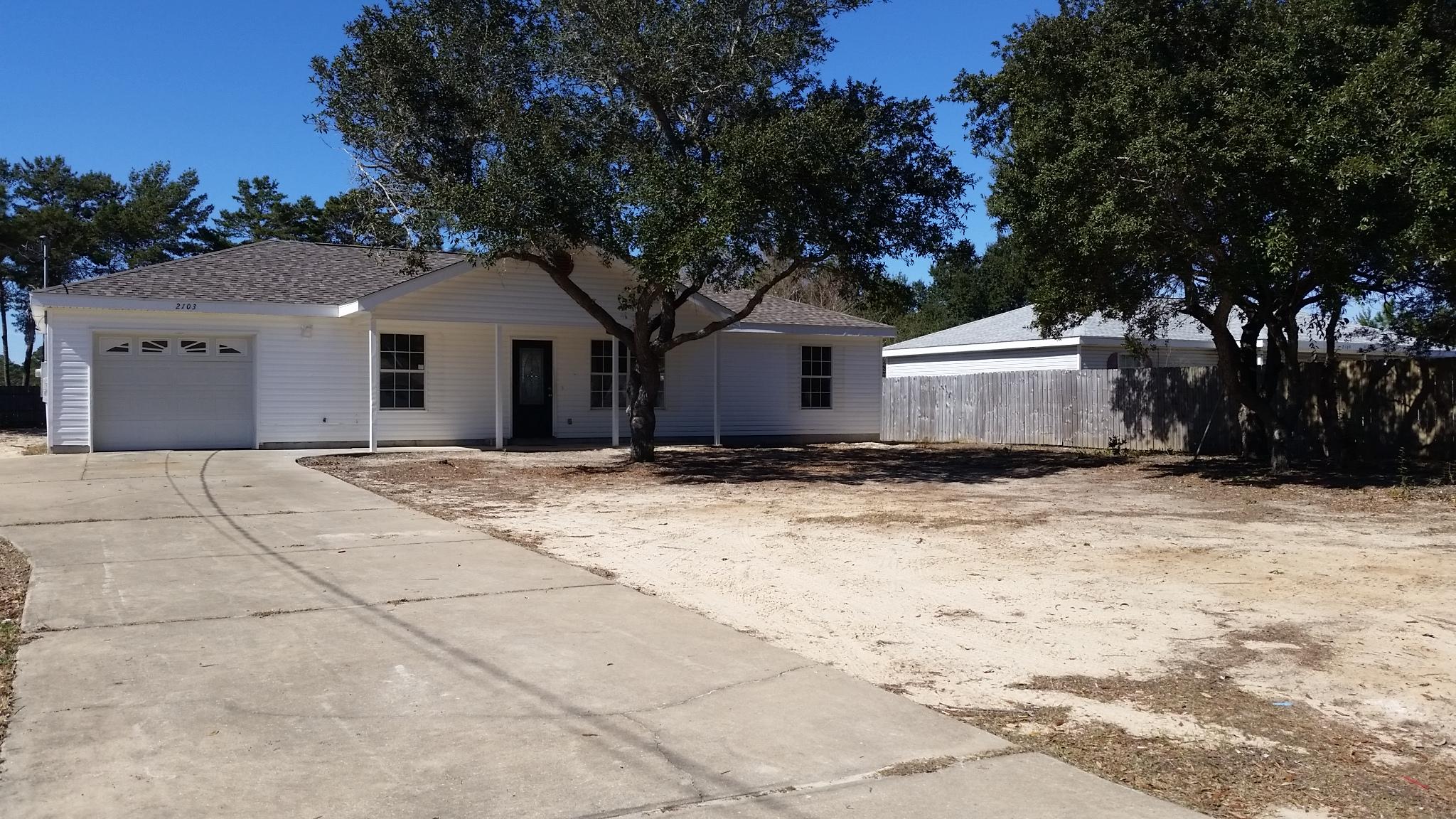 Nicely renovated home,with all new kitchen appliances, new roof, paint and flooring. Also new hot water heater with huge backyard and screened patio. Open living room with wood laminate flooring and separate dining room with split floorplan makes this a perfect home for first time homebuyers. Just 12 miles from Hurlburt Field, and less than 2 miles from the beautiful beaches of the Gulf of Mexico and conveniently located just about a block from both the Primary and Middle schools. Make this a must see on your list. Call today for your private showing.