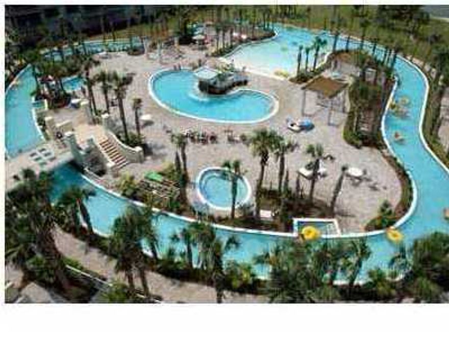 This gorgeous 2 bedroom/2 bathroom unit with bunkroom has been meticulously maintained. This unit will sleep 8 guests. The bayfront master bedroom has a king size bed, TV/DVD-VCR and private bath. There is a large guest bedroom and separate bunk room with a shared bath at the front of the unit. The living room has a queen size sofa sleeper. The kitchen is fully equipped with all BRAND NEW appliances and there is a stackable washer and dryer in the unit. NEW carpet and paint in 2014! The unit is just steps from the skybridge which provides access to the lazy river. There are four miles of secluded gulf and bay beaches nearby eastward to the Destin Pass. Restaurants, shops and the fishing pier are all within walking distance. Building is steel and concrete.