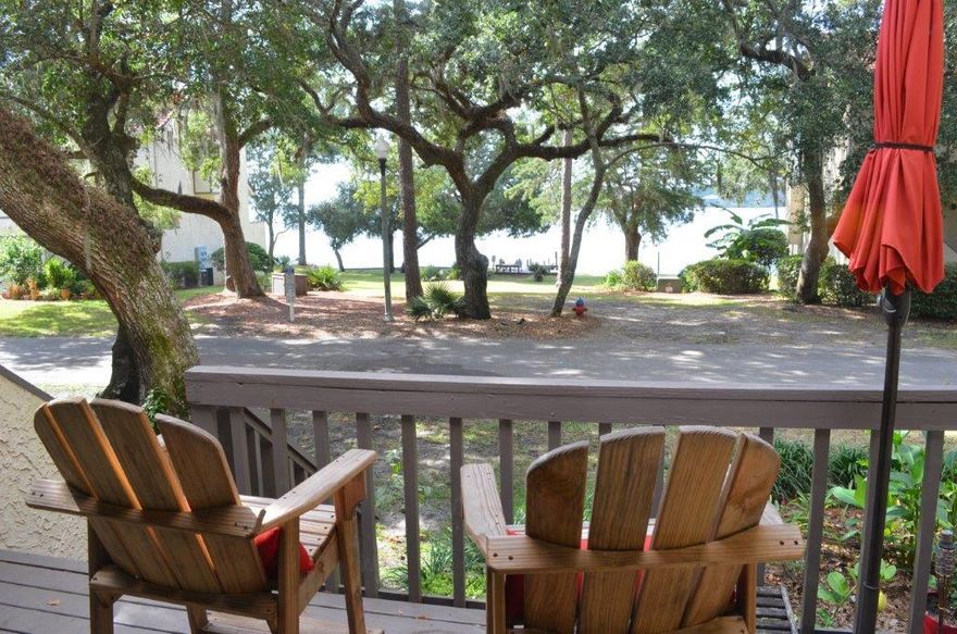 Beautifully Updated - this 2 bedroom, 2.5 bathroom townhome offers enchanting water views from all levels. Relax with your morning coffee from your balcony while you watch the birds at the water's edge. Unwind with your favorite evening beverage at the community dock that sits directly across from your back patio. Beautiful hand-scraped wood laminate flooring. New Light fixtures, kitchen cabinets, back-splash, Silestone counter-tops, Stainless Steel Appliances. Must see bathrooms completely updated. The master bedroom feels spacious with it's vaulted ceiling and expansive view. A unique sliding barn door becons you to your tastefully updated master bathroom complete with dual vessel sinks. Garage space and finished work room complete the ground floor. For practical details click