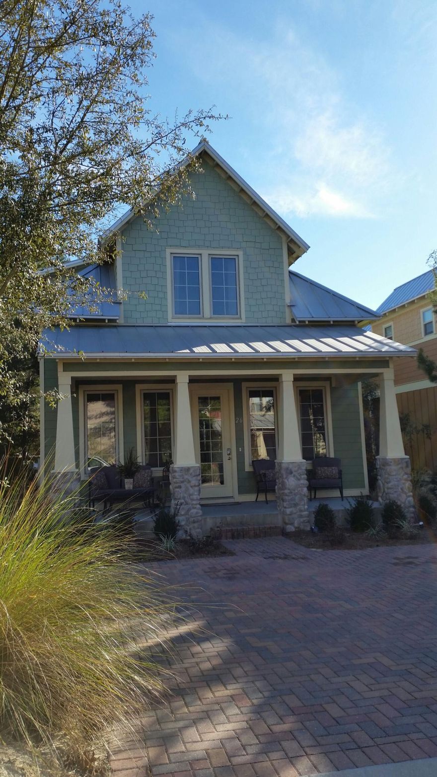 Close to Beach, this craftsman style beach home features Gas Fireplace, Casement windows,tile and wood flooring, granite countertops, beautiful cabinets, stainless steel appliances, and lots of storage!! This home would be a great primary, second home or short/long term Rental property. The Beach access is just a few blocks away as is all the shops and restaurants of Gulf Place. Only 16 homes in this quaint neighborhood in a quite preserve. A MUST SEE!! Furniture is included in the sale!