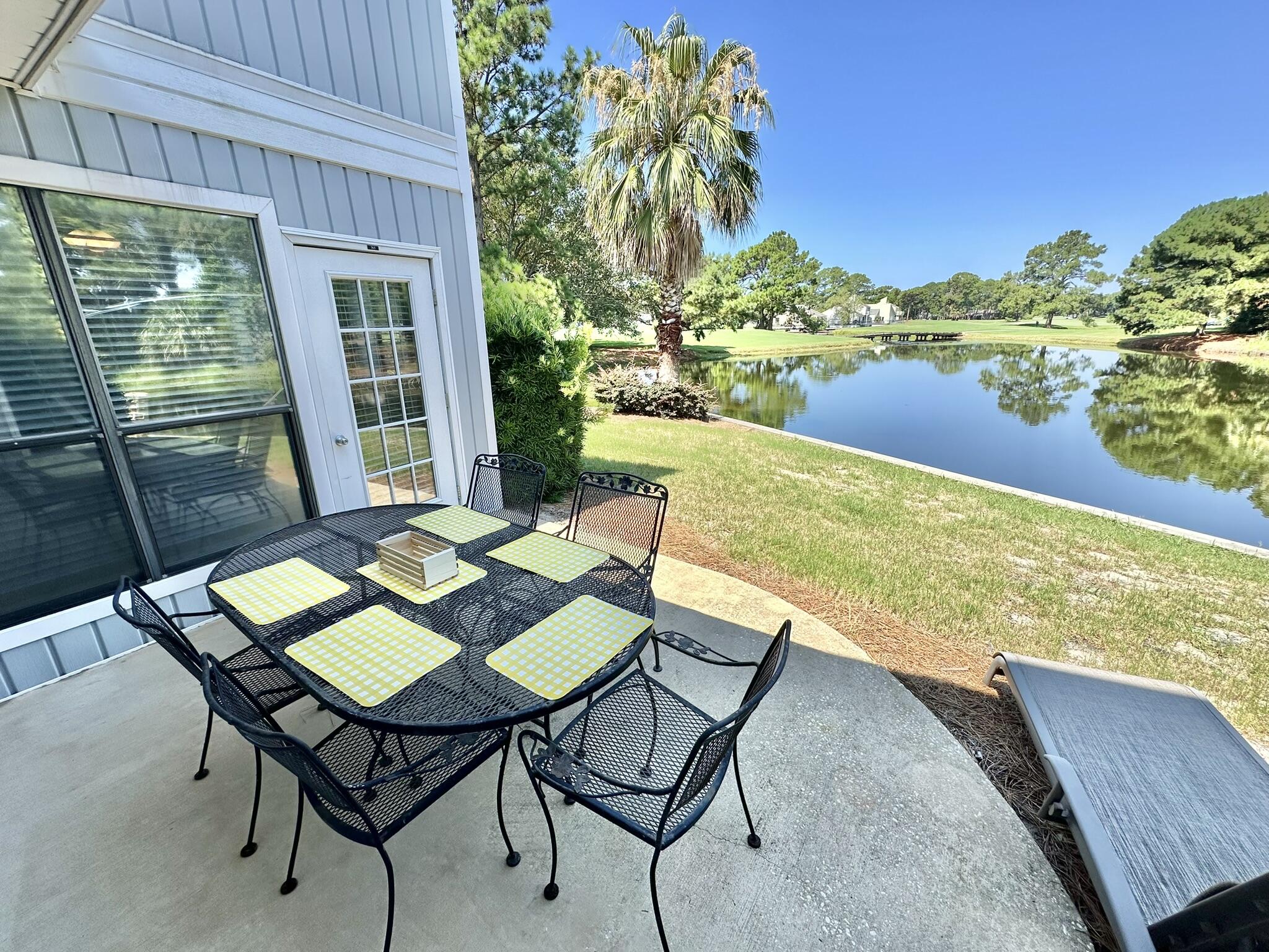 Wonderfull single family cottage with great view of lake and the Links Golf Course. Large open living area and screened porch leading to an outdoor patio cooking area. Great place to relax in the morning with your coffee or at night to enjoy the lake and your dinner. Inside you have 2 bedrooms with 2 baths and lots of windows.There is a covered porch by the front entrance and a large outside storage closet. Inside there are many more closets and pull down attic space. This little cozy cottage is just waiting for a new family to enjoy it and make it theirs.