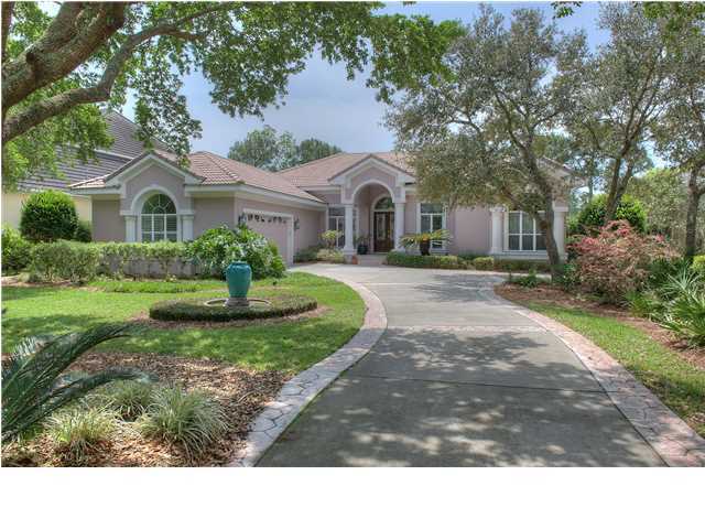 House situated on 110' deep water with 2 boat slips able to accommodate 50'+ boats. Beautifully maintained home with open floor plan in sought after Kelly Plantation gated community. Recently renovated kitchen to include all new stainless appliances (extra-large refrigerator, convection double oven, ceramic cook top, wine cooler), wood cabinets, granite countertops, pendent lighting and hardwood floors. What could be Fourth bedroom is currently used as a den/office. Screened lanai with heated pool and spa overlooks dock and Tom's Bayou. Guest Bedroom has separate sliding glass door entry to private, screened in patio. Guest bedroom also has a sink and storage for coffee and utensils allowing visitors a private area to make morning coffee before joining you in the living room.