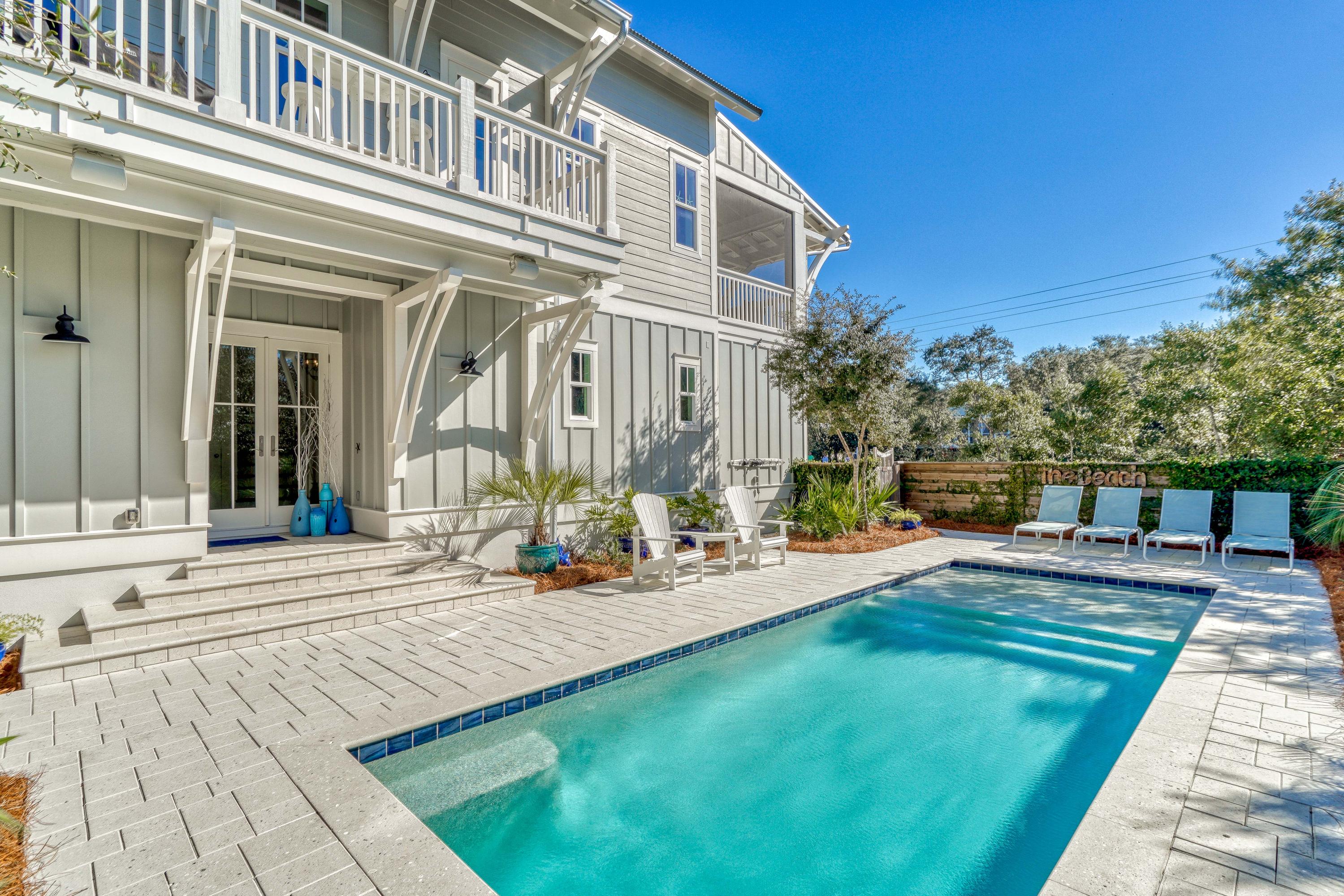 Superior Construction! Huge Lot! This 5 Bedroom home is placed on a large lot with a private courtyard full of mature scrub oaks and vegetation with a private pool to create the perfect Seagrove retreat south of 30A. It is a short walk from 3 public accessses. A 672 square foot garage with 2 storage rooms, and a fenced 40 ft pavered side yard which will accommodate a RV or boat and trailer along with a large pet area are just a few of all that is special here.High end trim and finishes throughout, wire brushed walnut floors, an elevator, and vast amounts of storage. This home was designed to live in! There are 2 living areas, one large screened porch and a grilling deck. Ask for our list of special features. It is extensive! This home must be viewed to be appreciated!