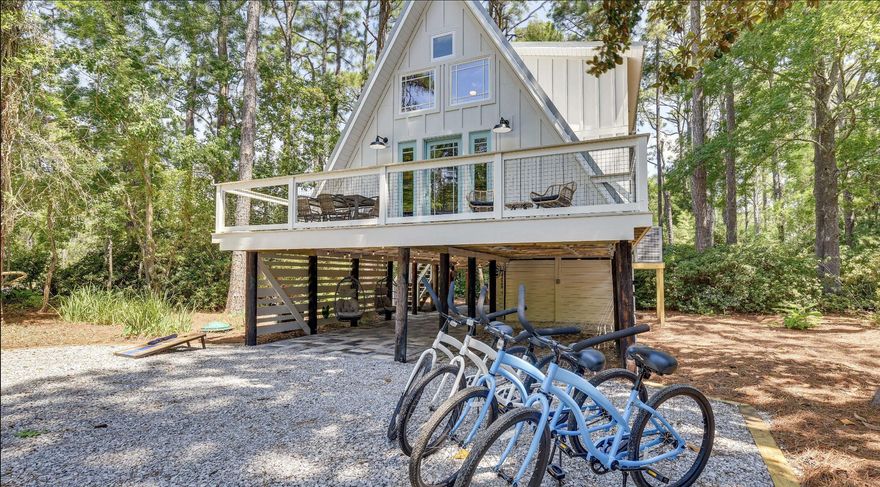 Step into luxury and comfort with the freshly painted interior, new roof, and new HVAC system of this stunning A-frame retreat. Every detail has been meticulously curated, from the all-new appliances to the sleek vinyl flooring that graces the space. Fully furnished and less than a mile from the beach, this cozy getaway offers the perfect blend of comfort and convenience for your Santa Rosa Beach beach home and getaway. As you enter, you'll be greeted by the inviting atmosphere created by the thoughtfully designed interiors. The open layout seamlessly flows from the living area to the dining space and kitchen, creating a perfect setting for gatherings and relaxation. The kitchen is a chef's dream, boasting modern appliances, ample counter space, and custom cabinetry.