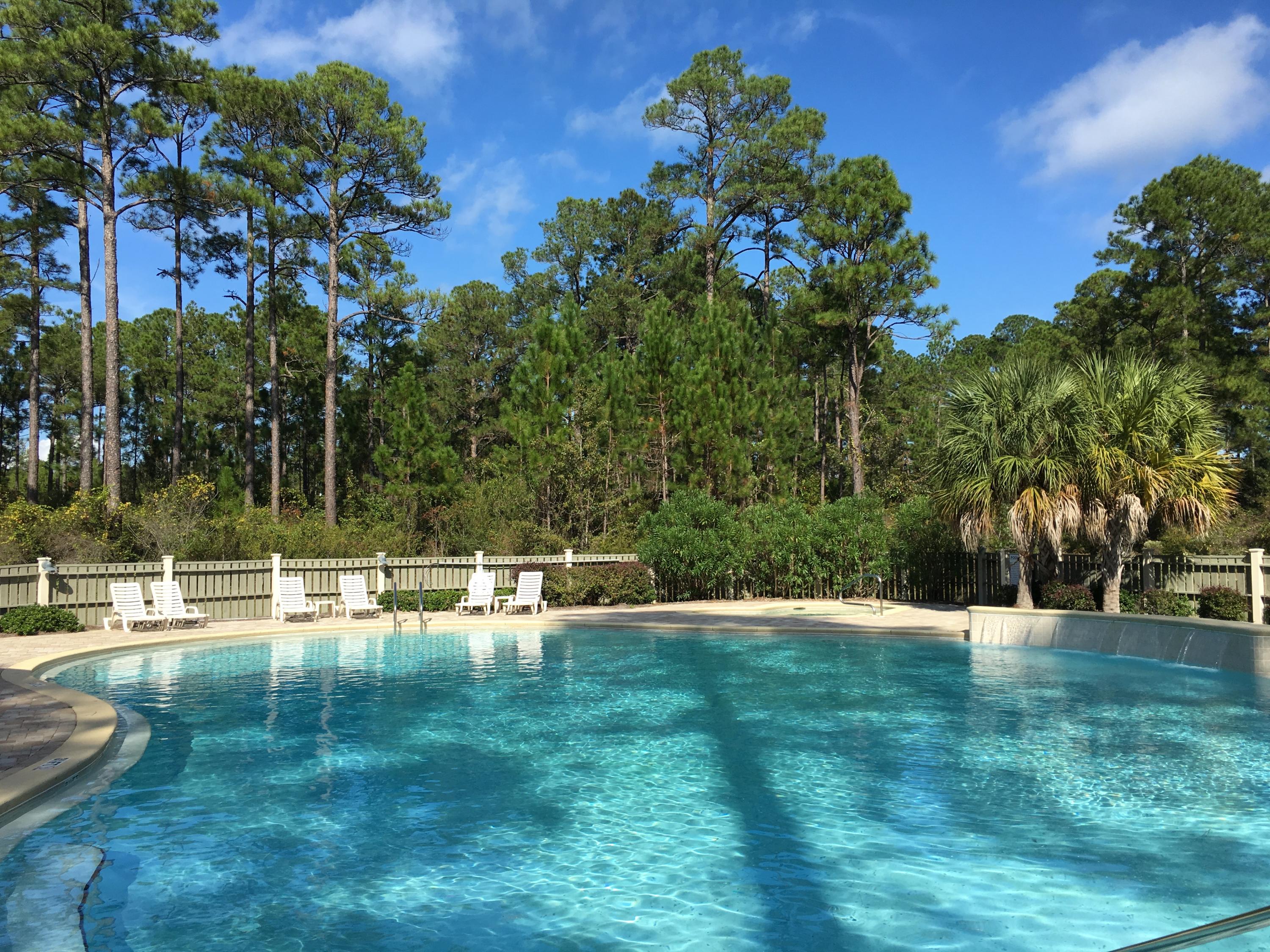 This is a full size Grayton Bayou homesite. This property has a 30% larger building footprint when compared to many of the other property's in Grayton Bayou. Approx. 4025 sq. .ft of buildable area. L. 5-31 Riker Ave has frontage on Riker Ave and it backs up to Private Drive 2 (Alleyway with white rock). On this property their is room to build main house and a carriage house. Community has Palm Tree and Oak lined streets. Roadway is stamped red brick style roadway. 2000 Sq. ft Swimming pool access. Community boat launch, fishing pier, bayfront park and all located only 5 mins from Grayton Beach. No wetlands. Not in a flood zone. Beautiful wooded homesite. Grayton Bayou CC&R's require florida cottage home with minimum size of 1600 Sq. feet see documents section for more information.