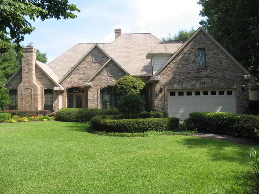 Panoramic water views from this beautiful lakefront home. Plush landscaping with multi covered patios overlooking the lake. Paver driveway and walkways which wrap around the entire home. Step inside to be greeted with gorgeous lake views and raised ceilings. Spacious great room with brick accent fireplace, large picture windows piping in natural light, all open to an updated kitchen featuring gas cooktop, large pantry, side by side refrigerator, microwave and dishwasher. Beautiful formal dining room and private study with its own fireplace! Home is equipped with Central Vac. Inside laundry and guest bath just off the oversized two car garage. Master suite located on the first floor with updated