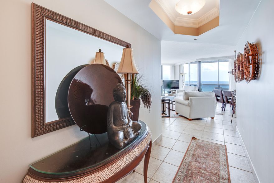 This stunning & spacious 2BR/2BA has 1313 sf and offers phenomenal views with floor to ceiling windows & doors. Condos in ''Gulf front'' section of the building are a rare offering,  Featuring a gourmet kitchen with granite counter tops, Custom rich Cherry Cabinetry & high end appliances. Bathrooms share the same granite counters & custom cabinetry with the beautifully destined kitchen. The spacious living/dining/kitchen/master & guest bedroom all have access to the wrap around terrace. Property is being offered fully furnished including art, accessories and window treatments. Resort amenities include expansive pool deck overlooking the gulf with a heated pool, hot tubs, bath house with showers & sauna, sports deck with tennis, basketball, fitness center, heated & cooled interior corridor