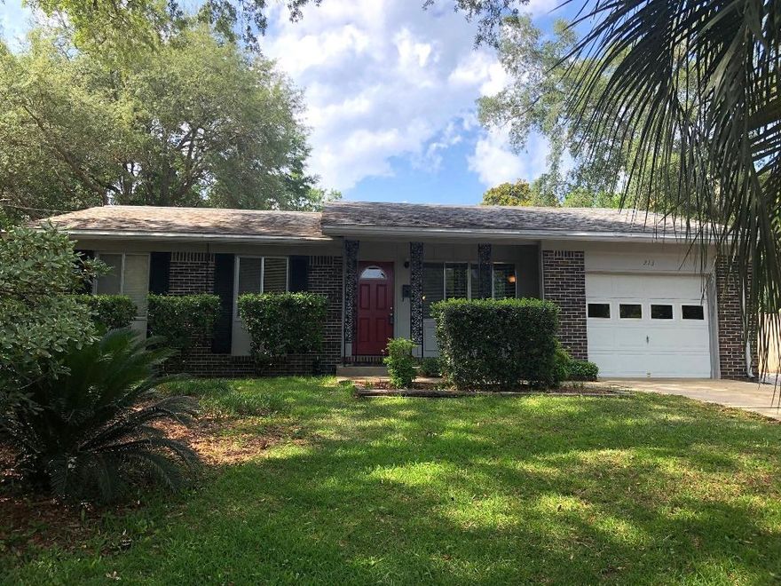 Wonderful home with multiple living areas and a garage in the heart of Niceville that is MOVE IN READY!! This 3 bedroom, 2 bath home also features both a living room, a family room AND an office giving a family lots of room to expand. There is an attached 1-car garage AND an additional detached 1-car garage/workshop...the perfect place for the handy person of the family! There is a covered porch looking over the large back yard that also has a yard building. Recent improvements include: new flooring in living areas and kitchen, paint, fixtures, electrical panel, gas water heater, garage door opener and front door. Move in ready homes like this one in this price range dont last long so make your appointment to see this gem soon before it is SOLD!