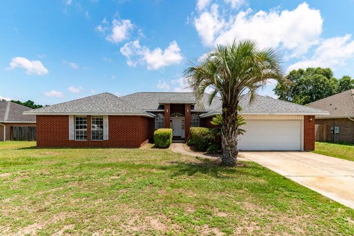 NEW ROOF.. NEW FLOORS.. NEW PAINT and this SPRAWLING BRICK RANCH is the LOWEST PRICED IN CHEROKEE BEND!!! Welcome to 2837 Tamiami Trail! This long-term highly lucrative rental boasts an oversized 4 BR/2 Bath **PLUS FLEX ROOM**floorplan that blends spacious design with functional living. Step inside to tiled entry, elevated ceilings, neutral paint and large picture windows that flood the home with natural light. The Living room is oversized with vaulted ceiling, BRAND NEW FLOORING, large windows and designer paint and FRENCH DOORS THAT LEAD TO A BACKYARD OASIS! Details on the backyard a little later. The cook's kitchen offers white shaker-style cabinetry with ebony solid surface counters, an expansive kitchen island that the family chef will enjoy There's also a separate cabinet area perfect for coffee bar or beverage station! Did I mention this home comes with a FORMAL DINING ROOM AND A SEPARATE DINING AREA INSIDE THE KITCHEN? #HUGEKITCHEN
The master suite boasts BRAND NEW CARPET, neutral paint, WALK-IN CLOSET and a master bath that offers expansive laminate counter with 2 sinks, standard tub/shower combo and SIGNIFICANT UNTAPPED EQUITY!
All remaining bedrooms are large with generously sized closets, and are conveniently located to the guest bathroom.
The flex room offers endless possibilities, and would be perfect for a home office, gym or even a 5TH BEDROOM!
The laundry room is LARGE and boasts numerous shelves for pantry items and household goods.
Now let's talk backyard! French doors lead you to your own backyard oasis! The deluxe-sized open patio is perfect for backyard grilling and entertaining. The yard is flat, privacy-fenced and will accommodate an inground pool! #Serenity
BONUS: COUNTY TAXES AND QUICK COMMUTE TO THE BASE!
Owner has made several recent updates and this one is PRICED TO MOVE! Make an offer today.