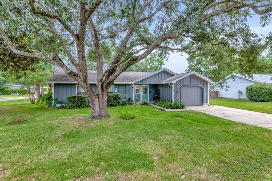 Cute as a button! This adorable 3 bedroom 2 bath home sits on a large corner lot flanked with large beautiful trees. The primary bathroom ensuite has just undergone a makeover with a gorgeous tiled shower. The primary bedroom has a raised ceiling, tile floors and a walk in closet. In the bright and airy kitchen you will find newer white cabinets, granite counters and stainless appliances. The current owners had a gas line ran to the home and installed a 5 burner gas stove in 2019. One of the few home in the neighborhood with natural gas. They also installed a new gas water heater at that time. No more worrying about having hot water when the power goes out! The sleek and stylish refrigerator and the dishwasher were just purchased this year. Click for More...