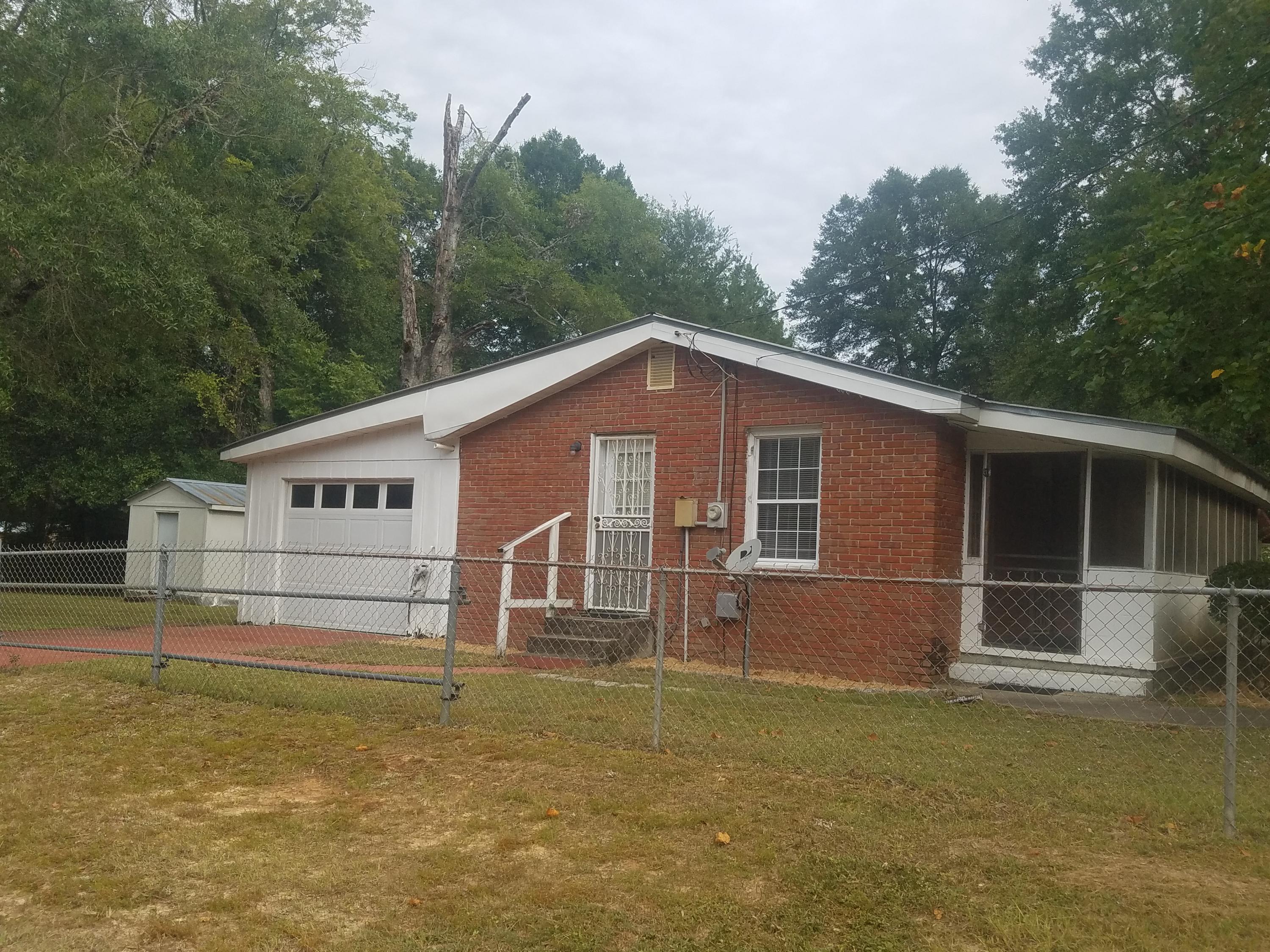 Handy Man Special! Awesome lot, fully fenced in yard, screened in front porch, on a corner lot, with just a little TLC this would make a cute starter home.
