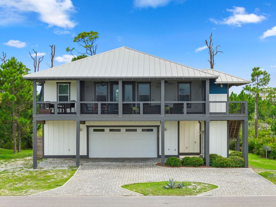 This North Cape San Blas vacation home gem checks all the boxes! Gulf side, Dedicated Beach Access via Secluded Dunes, with beautiful views of St Joseph Bay. Located in the Gated community of Park Point at Secluded Dunes on North Cape San Blas, this subdivision is surrounded on three sides by St Joseph's State Park and additional conservation area. Less than 5 minutes to the park entrance with more beach and bay access options as well as a fully functional boat launch. Park Point also has a community pool as well as a dedicated beach access that meanders through beautiful coastal oaks and terminates at a very wide beach on the North Cape. Home has an open floor plan with vaulted ceiling and sky lights for a warm and welcoming feel. The spacious living and dining areas as well as a computer desk office nook flows well and is very functional. Kitchen with breakfast bar that has beautiful granite countertops and cabinetry. 4 bedrooms with 3 en suite bathrooms gives one privacy options throughout, while the 4th bathroom is easily accessed by guests. A large, well furnished, and full length, screened front porch is completely screened and has beautiful views of St Joseph Bay and the undeveloped state park. The lower level is accented by a brick paver driveway and natural landscaping. The enclosed garage is set up more like a huge bonus fun room that is appointed with; finished floor, sitting area with TV, ping pong table, cabinetry, additional functional space. Adjacent is the large bottom back screened porch complete with; large swim spa, grill, dining area ,and outside shower. Take a moment to view our 360 tour and feel free to ask for your virtual or private showing. Currently a vacation rental so this listing is appointment only. New buyer fee is a percentage of sales price, ask agent for details. Some dimensions were obtained via the Gulf County Property Appraiser's website. Please verify if important.
