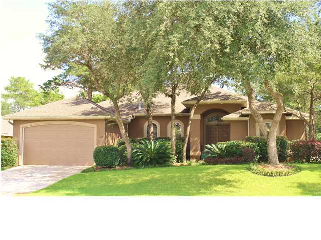 Don't miss your opportunity to own this exquisite, FOUR BEDROOM home with a private screened-in POOL, in the exclusive development of Chardonnay Estates. This home is perfectly situated in the area of Bluewater Bay, close to the beaches and shopping in Destin, the bay front Maxwell/Gunter Recreation Area, and Eglin Air Force Base. Upon entering, you will appreciate the two living areas separated by a GAS FIREPLACE, high 11' ceilings and double tray ceilings. With a desirable split floor plan, there are two bedrooms on each side of the home. It is a perfect home for entertaining with a spacious chef's kitchen with GAS STOVE and STAINLESS appliances. The kitchen also has gorgeous cabinets, tons of storage, and GRANITE countertops. For the wine connoisseur,