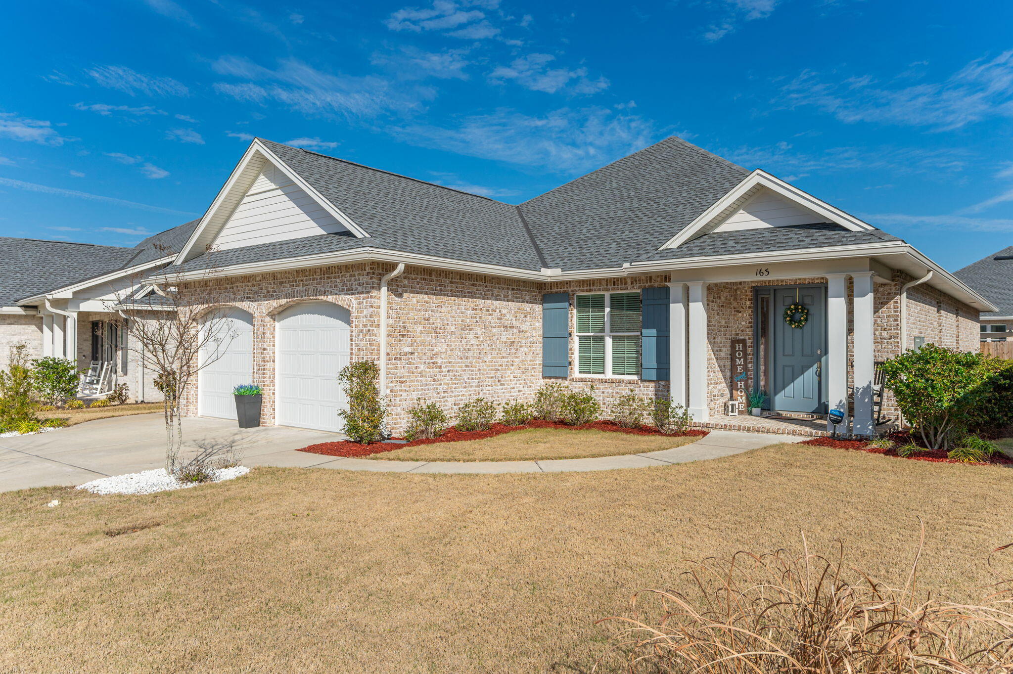 This exceptional 4-bedroom, 3-bathroom residence was built just three years ago by one of the area's premier builders. It offers beauty and convenience, with its prime location in a neighborhood with sidewalks and buried utilities, just minutes from Eglin Air Force Base, top-rated schools, and the stunning beaches of Destin. From the welcoming entry foyer, you'll see how the open-concept floor plan is bathed in natural light and boasts gorgeous interior finishes, including 8-foot doorways, luxury vinyl plank (LVP) and tile flooring, and pristine quartz countertops. The cabinetry throughout the home has soft-close hinges and drawers. The storage! Every bedroom has a walk-in closet and there are multiple hall closets. The sparkling kitchen is equipped with stainless steel appliances, a large island, and a pantry. The kitchen opens to the spacious living room which is highlighted by a striking electric fireplace. Additional features include a tankless gas water heater, an EV charger in the garage, and a thoughtfully designed mudroom/landing zone. The fully landscaped yard is equipped with an irrigation system, easy-maintenance landscaping, and fenced backyard. Relax and enjoy the outdoors from the comfort of the screened back porch. Seller would prefer to occupy until early June.