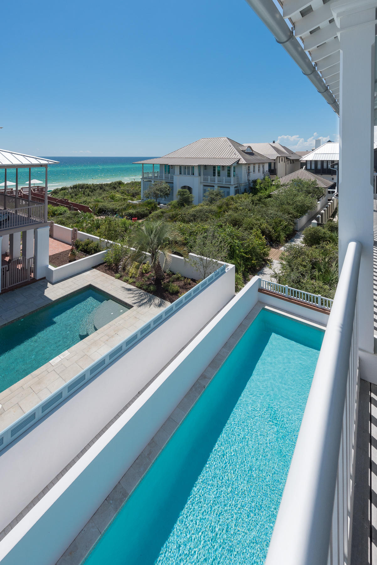 JUST ONE HOME OFF THE GULF w/ STUNNING GULF VIEWS! This delightful home was designed by Melanie Taylor of Melanie Taylor Architecture and underwent a major renovation by Darrell Russell of A Boheme Design in 2012. The home is situated on the HIGHEST RESIDENTIAL LOT SOUTH OF 30A IN ROSEMARY BEACH allowing for spectacular GULF VIEWS FROM BOTH THE 1ST & 2ND FLOORS. This charming home seamlessly blends interior to exterior porch & courtyard spaces and the floor plan invites large family gatherings. The SOLID CONCRETE CONSTRUCTION with Mahogany doors, shutters & rails make this a truly fortified home with little maintenance needs. Coming off the boarwalk to the Beach and entering the grand Foyer you are greeted by soaring 11 to 13 foot ceilings that leads to 4 guest suites & 2 Full Baths with