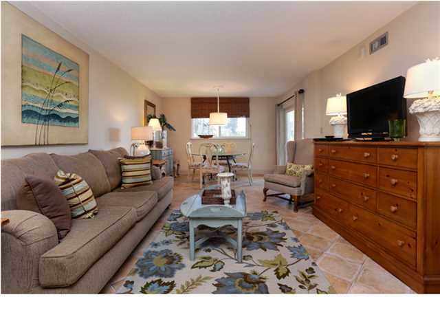 Beautifully upgraded and fully furnished 3-bedroom, 2-bath condo with charming beach decor. This unit is conveniently located on the ground floor with access to the beach just past the patio. This is an incredible price especially for the interior upgrades. Terra cotta tile floors extend throughout the entry, kitchen, living area, and bathrooms. The kitchen has new cabinetry, beautiful thick countertops & breakfast bar, large farm sink, and stainless steel appliances. Enjoy the open floor plan, upscale furniture, and flat screen TVs. There is an additional dining area close to the patio. The patio is perfect for outdoor dining or entertaining with views of the Gulf of Mexico. The master bedroom also has direct access to the patio and is very spacious with a king bed, flat screen TV, and