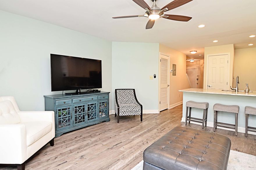 Lovely 2bed/2bath condo with Loft and additional finished storage area in Lakeside at Bluewater Bay! Recent upgrades include: granite counters throughout, stainless appliances (convection microwave), tankless water heater, shaker-style cabinets in kitchen, LVT flooring throughout with oak steps, popcorn ceiling removed, double-doors to master, bathroom vanities, mirrors & toilets, new tile in master shower & new shower/tub combo in downstairs bath, new ceiling fans & light fixtures throughout new glass in skylight, fresh paint, keypad deadbolt entry, new door & shelves for pantry, A/C replaced in 2011. Finished upstairs storage area, outfitted with insulation, drywall & flooring; perfect added space for office, playroom, etc.This one is a MUST see! Great location, value, and investment!