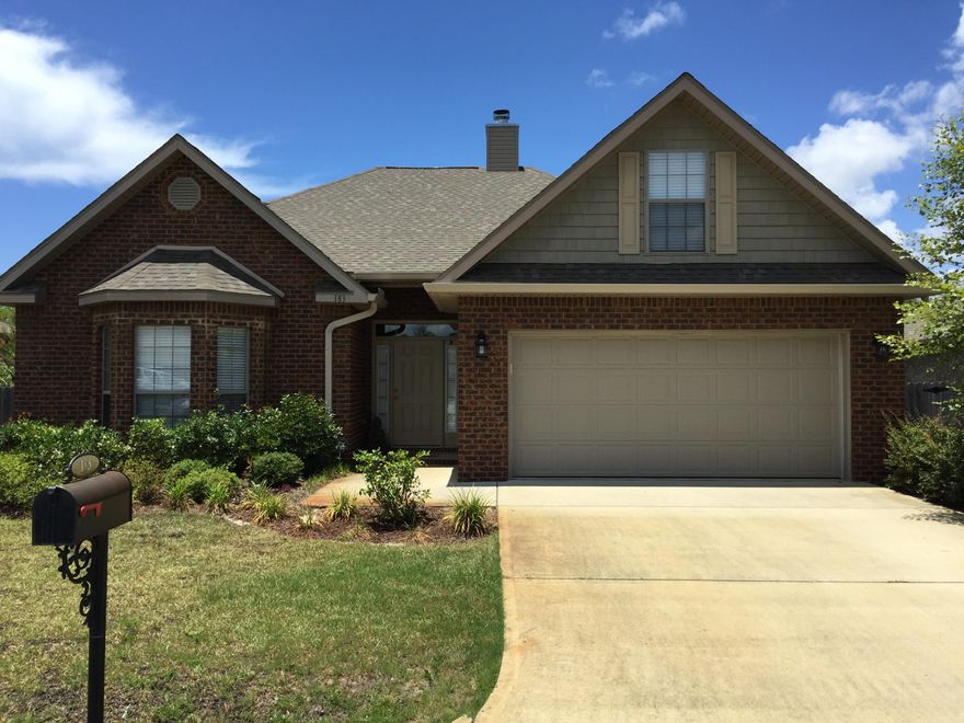 Beautiful, all brick, 2,237 SF, 4 Bed/2Bath home, just minutes from schools, shopping, restaurants, & 30A beaches! Wood floors in the foyer, hall way, living room, kitchen, dining room & sun room, carpet in all of the bedrooms, granite counter tops throughout, & an open floor plan. A main feature is the 800 SF deck, perfect for relaxing, or entertaining friends & family. Beautiful, large back yard, backs up to a protected nature preserve, great for families with children and dogs. Some of the many home features include, crown molding, fireplace, S/S appliances, home security system, surround sound system with speakers and