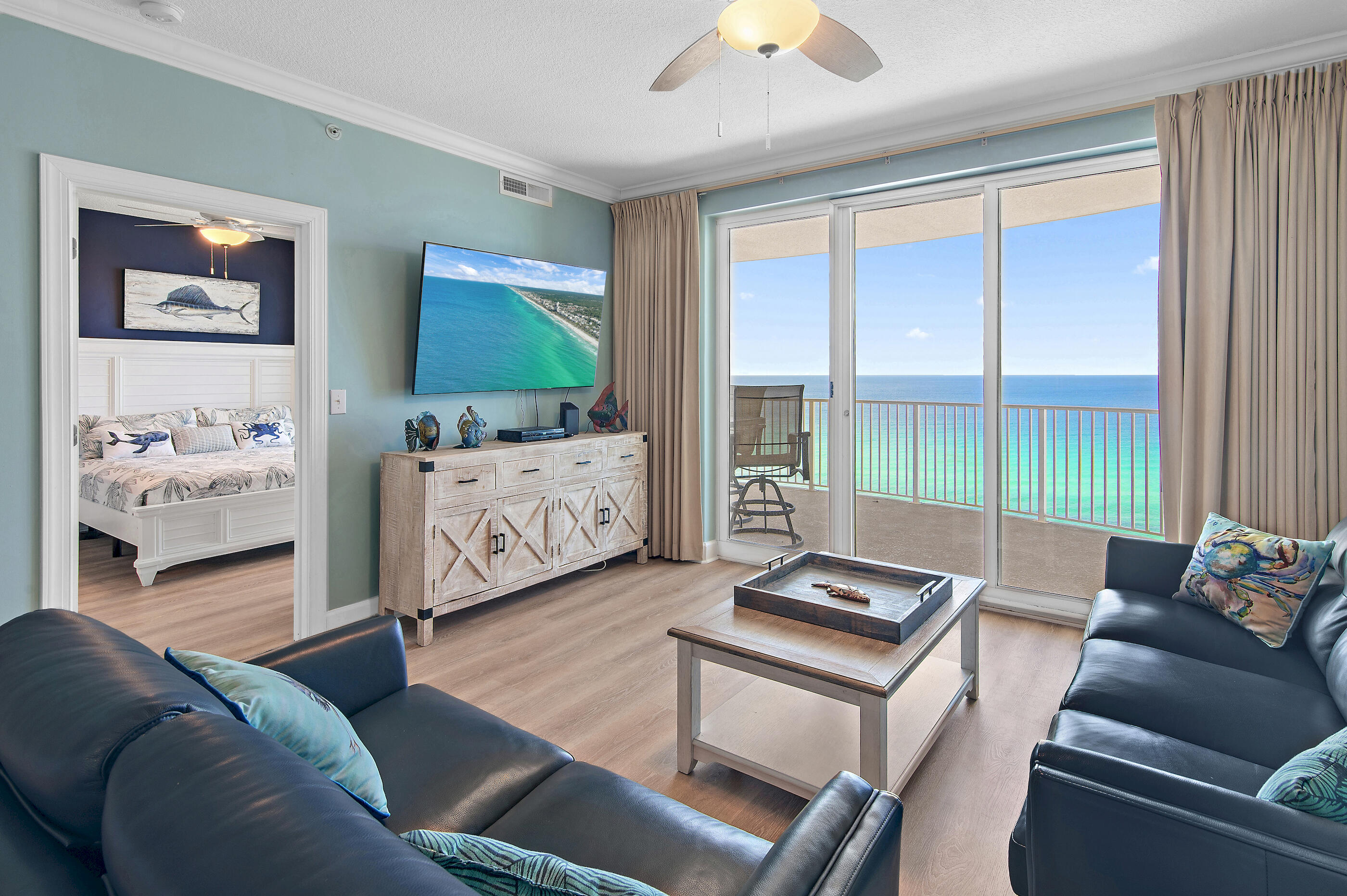 Imagine waking up to the sound of waves and stepping out onto your own private balcony with endless views of the Gulf. This beautifully updated 2-bedroom, 2-bath condo at Emerald Isle is the perfect blend of comfort and coastal living. Thoughtfully furnished and completely turnkey, every detail has been designed so you can start enjoying the beach life from the moment you arrive. The master suite becomes your personal retreat, with balcony access for morning coffee overlooking the water and a spa-inspired walk-in shower. The open living and dining area flows seamlessly to a spacious balcony where family dinners, sunset cocktails, or simply soaking in the salt air become part of your everyday routine. Life here extends beyond your condo walls. Spend the day lounging by one of two Gulf-front pools, unwind in the hot tubs or sauna, or keep up with your fitness goals in the on-site gym. When it's time to venture out, you're just minutes from the energy of Pier Park, with its shopping, dining, and entertainment options, not to mention the brand-new Topgolf that adds a fresh layer of fun to your evenings.
Whether you're searching for a vacation retreat, a savvy investment, or a place to call home, this condo invites you to embrace the true beachfront lifestyle.