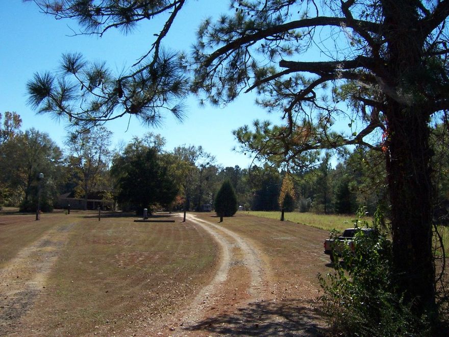 Foreclosure! Two story house on 95 acres in North Holmes County. Private setting with huge front yard since house sits back off the road. There are 2 bedrooms and a bath up stairs, and 1 bedroom and bath downstairs. Home has large carport and several barns and outbuilding. The home and buildings need some TLC, so bring you toolbox. The home is on private well, septic, and has a crawlspace. The property has a beautiful large flowing creek that meanders through it. The majority of the land is grown up, but there are some hunting trails through it. Property is sold ''as is''