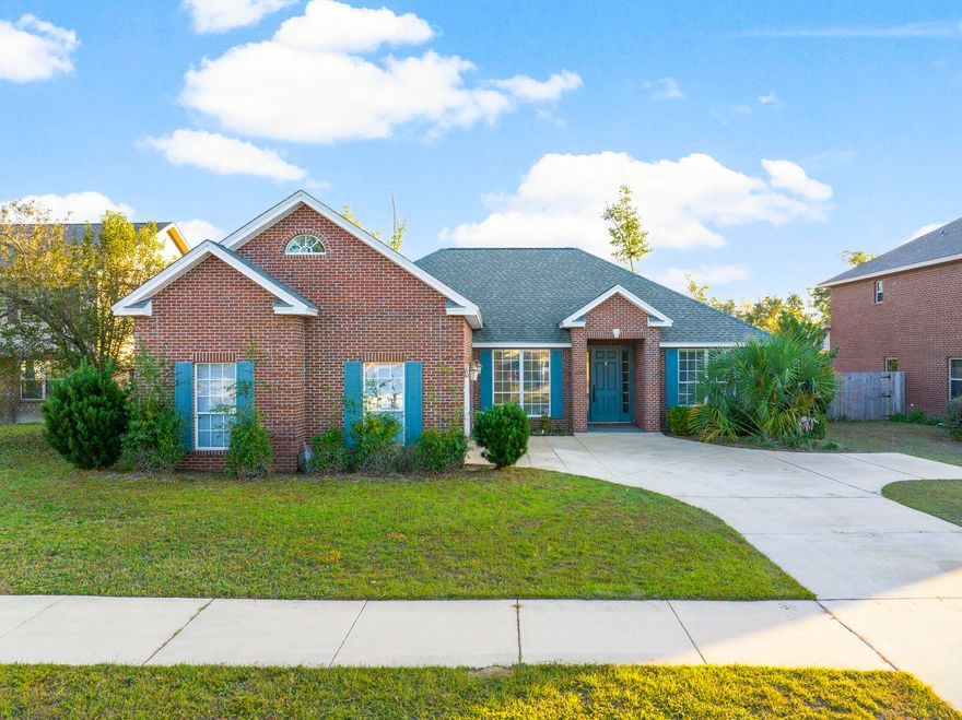 Step into your dream home! This 3-bed, 2-bath brick beauty contains 12ft ceilings and stainless steel appliances in the kitchen. The master bedroom is a closet lover's dream with separate his and hers, a spa-like tub and a separate stand alone shower. This home has loads of storage, a bonus room, and a spacious screened in porch overlooking the fenced yard. Bonuses of this home include a sprinkler system and a desirable 2-car garage. Possibly the best part of this house is that it is just a quick stroll to the country club and super close to stores and parks. Don't miss out - call for a showing today! Your cozy haven awaits!