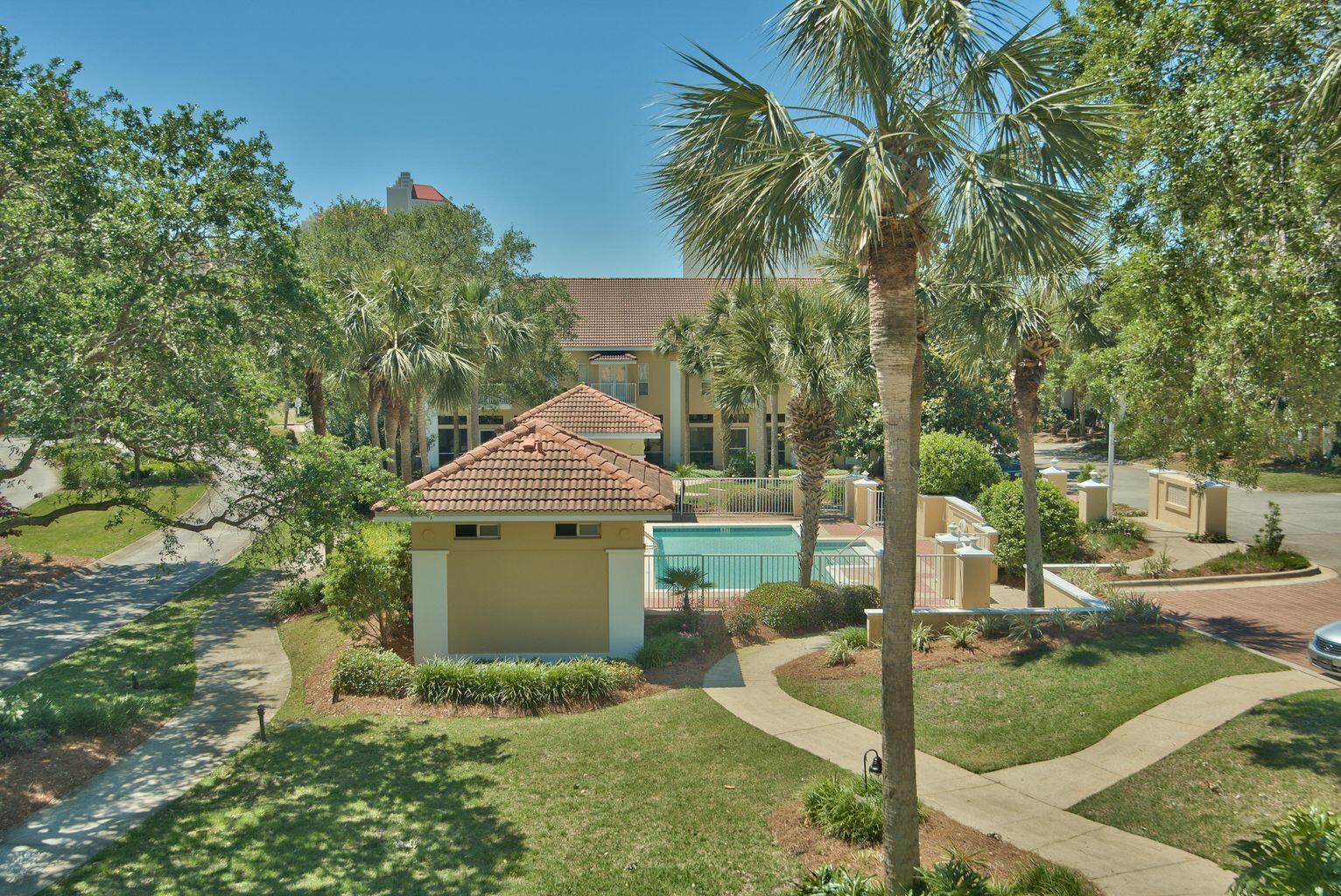 This three-bedroom townhome located in the Tops'l Beach and Racquet Resort includes a private 2-car garage and is being sold fully furnished. This quiet neighborhood called Captiva in Tops'l consists of only 22 residences. A gated, private courtyard greets you as you walk to the front door. On the first level, the open living, dining and kitchen are ideal for family get togethers and entertaining. Sunlight streams into the dining area from skylights above. Tile floors run throughout the living areas. French doors lead to the screen lanai off the living room, which is ideal for a beverage after a day at the pool or the beach at Tops'l. Buyer to verify all dimensions.