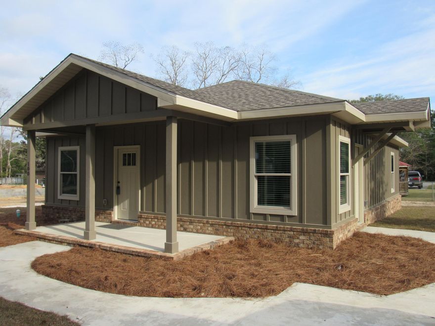 PRICE REDUCED! Spacious 4 Bedroom 2 Bath NEW home in Defuniak Spgs! This energy efficient home has top notch quality construction including Hardie board/brick veneer siding, vinyl windows, 5/8in insulated roof decking, R-13 exterior wall insulation, extra insulated (sound proof) baths and laundry room, custom closet built-ins, dimensional shingles, LED lighting, LOTS of recessed lighting, luxury water proof laminate flooring, upgraded trim, Quartz counter tops, All New Appliances (including Refrigerator) Garbage disposal and Window Blinds! This is the highest quality constructed new home on the market! Don't miss out on this one! Call for your tour today!