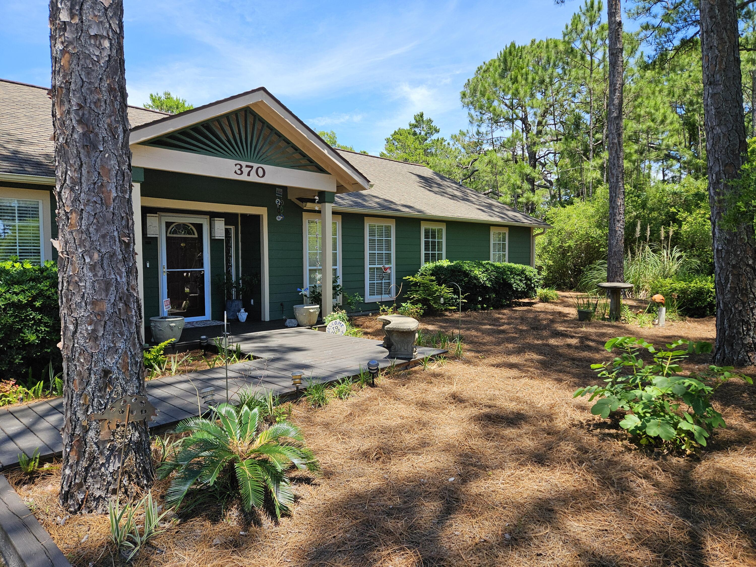 Live at the beach or use as long term or vacation rental property, fully furnished, ready to move - at the end of the day retreat to your quiet residential setting that backs up to the state protected forest; where the deer, birds and squirrels play. This lot has a 80' deep, 100' wide open backyard with an out building, fully insulated w/ac and heat - perfect for an art studio, workout room or transform to a suite.Home has 11' vaulted ceilings that add to your comfort - located south of 98, 30' above sea level and less than a mile to the gulf. One owner, never rented. VIEW Property Today!