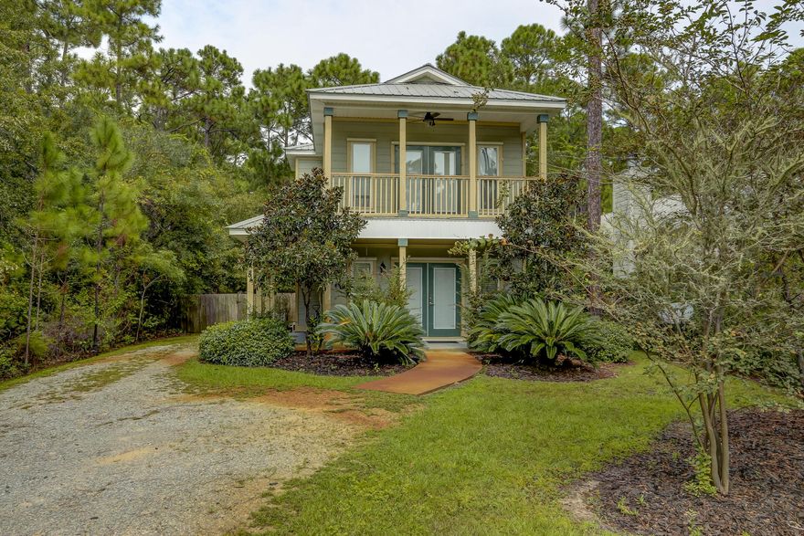 Beach vibes in a woodland setting just a block from the bay. This house is situated at the end of a quiet, newly paved road in the desirable Point Washington neighborhood. It is ready for you to move right in with newly painted walls, new carpet and window treatments, updated kitchen and baths.There is a new security system and a new AC unit. With 3 bedrooms, 3 full baths, a large fenced yard and 4 porches there is plenty of room for living. This home is down the road from Grayton Beach and all that 30A has to offer while also offering the privacy of being away from the crowds.Please let us show you this hidden gem