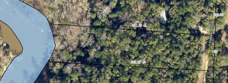 Beautiful High and Dry lot located right on the Yellow River. Flood insurance should not be needed due to elevation. Bring your house or cabin plans and have a perfect spot with scenery to appreciate each morning! Sign on property and two pink flags across the road marking approx lot lines.