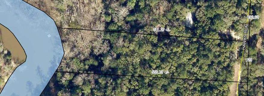 Beautiful High and Dry lot located right on the Yellow River. Flood insurance should not be needed due to elevation. Bring your house or cabin plans and have a perfect spot with scenery to appreciate each morning! Sign on property and two pink flags across the road marking approx lot lines.