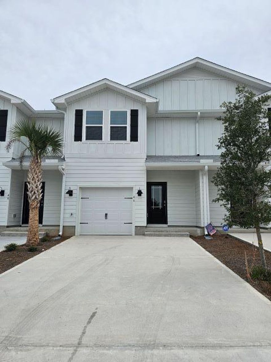 AVAILABLE NOW!  Brand new townhouse in Destin Florida central to beaches, schools, a waterpark and world famous Crab Island!  Just 14 miles from Eglin AFB, this beauty sports 3 bedrooms, 2/5 baths and a one car garage.  Spacious living area and gorgeous kitchen featuring white cabinetry, quartz counters, stainless appliances and a farm style with a large breakfast bar.  All appliances provided including a washer and dryer and lawncare included!  You don't want to miss this one!  Call or message me today for your private tour.  Applicants to verify all items deemed important such as schools and room measurements.  No cats, one dog up to 70 lbs with owner approval and $400 nonrefundable pet fee.  Photos used could be of a similar unit or model home.