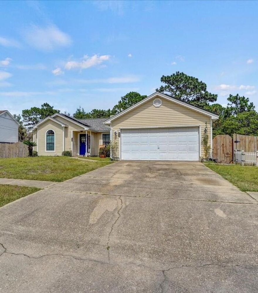 Beautifully renovated home in the Heart of Navarre! Situated perfectly to the East of the Navarre Bridge, this home offers an easy commute to beaches, shoppes, and military base! Walkthrough this completely upgraded home, featuring newer floors, paint, kitchen countertops, large farm sink, stainless steel appliances, newer roof, and updated bathrooms! The living room offers plenty of space along with a dining area, and open concept kitchen! The backdoor is also newer which leads to a deck & large, fenced backyard! This home features a 2-car garage; as well as PAID OFF Solar! Schedule a showing today!