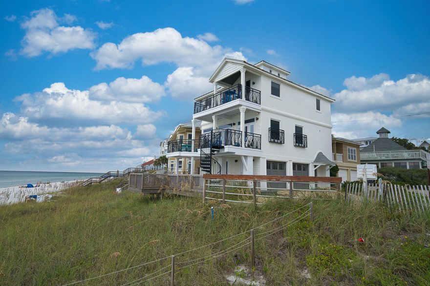 Beautiful, DIRECT GULF FRONT beach home. NO HOA.  Must-see PHENOMENAL gulf & beach VIEWS. 2 decks, 3 stories. Primary suite, w/direct beach & gulf views, & balcony access. Primary ensuite bath area has wrap around windows looking out over the beach and gulf. 2 custom cabinets in primary suite. Property features 4 beds, 4 baths. One of these bedrooms is set up as a bunkroom. On the very top, is a small area with another bed. This area is in addition to the 4/4 count.  Each floor has an owner's closet except 4th floor. Kitchen has owner cabinets, Sun deck-bottom floor w/access to 1st floor bath. 2-car garage, & parking pad for 3 vehicles.  House is currently in a rental program - see Documents Tab for rental projections, survey info., etc. Buyer to verify any information deemed necessary.